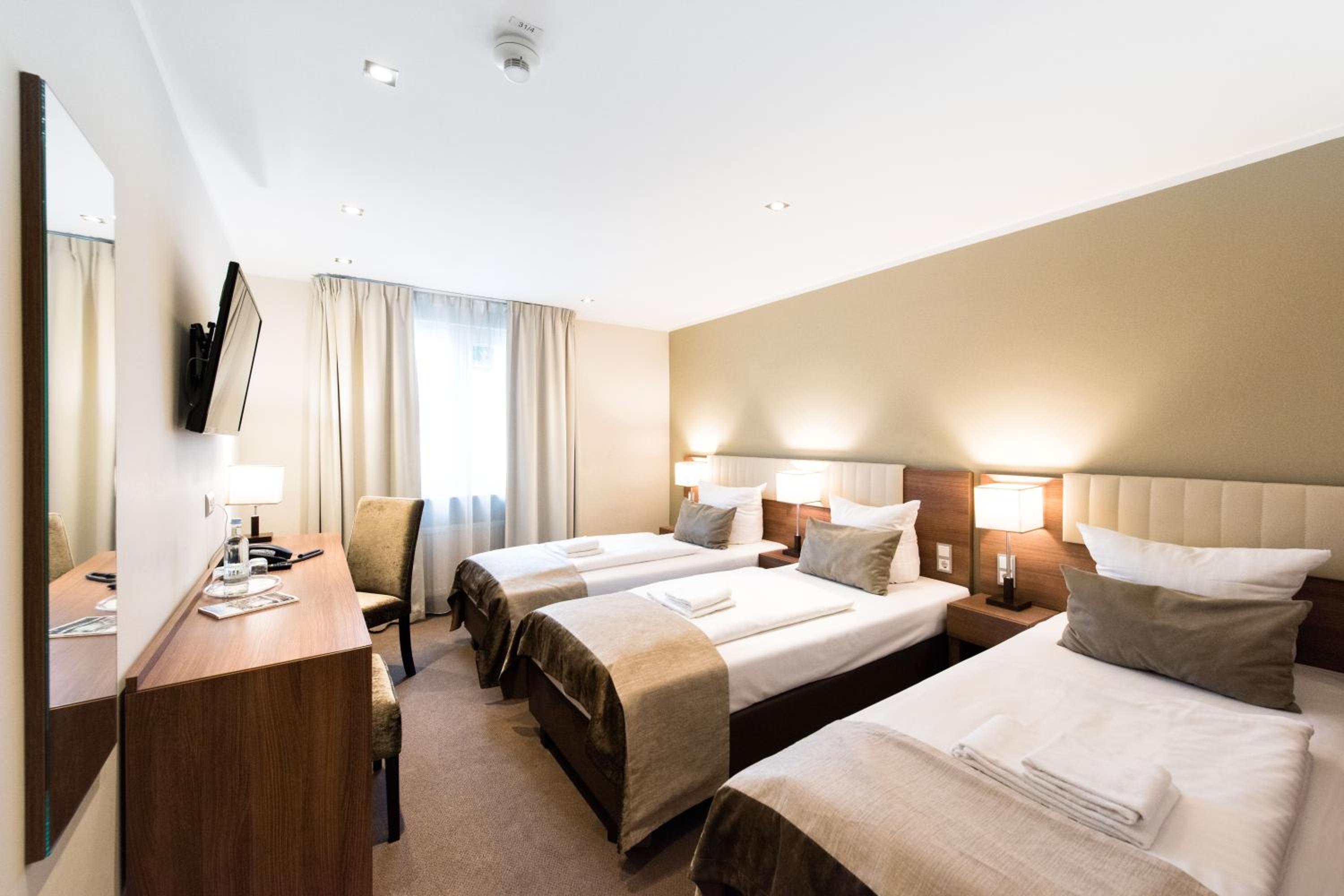 Triple Room - Photo 1