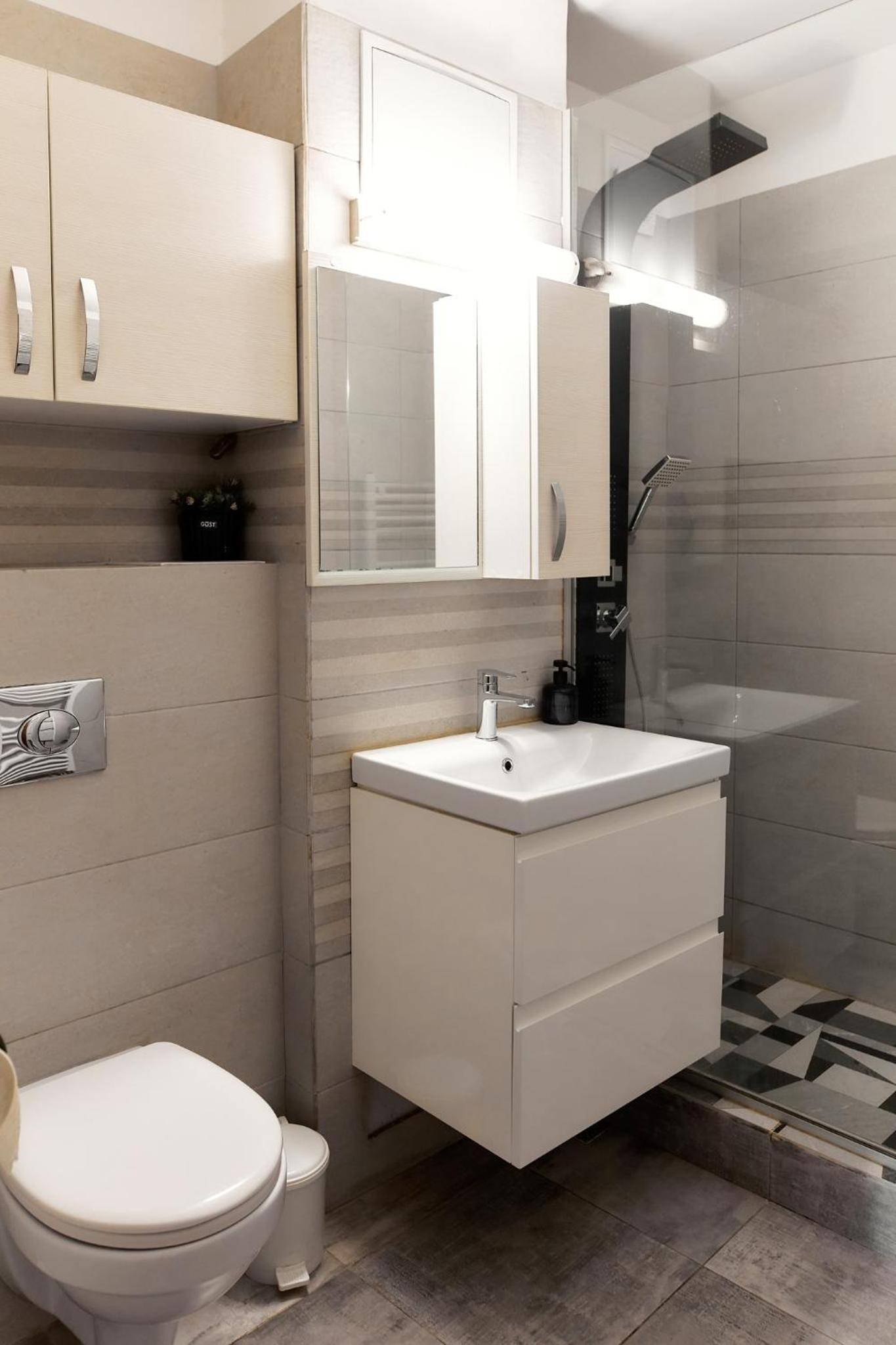 Three-Bedroom Apartment - Photo 23