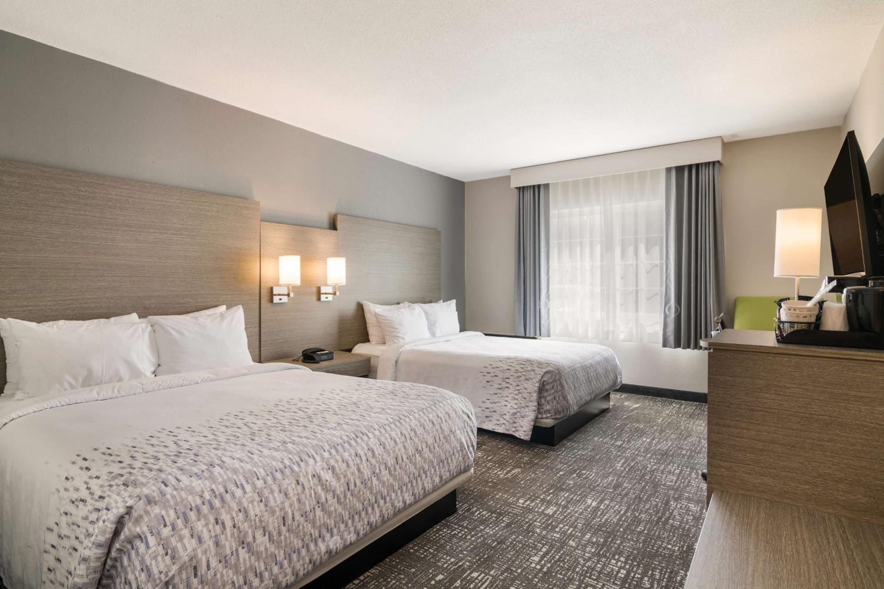 Queen Room with Two Queen Beds and Mobility Accessible Tub - Photo 1