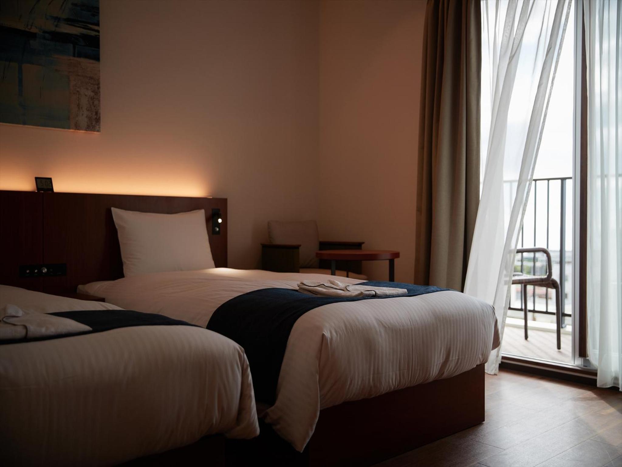 Deluxe Twin Room - Photo 24