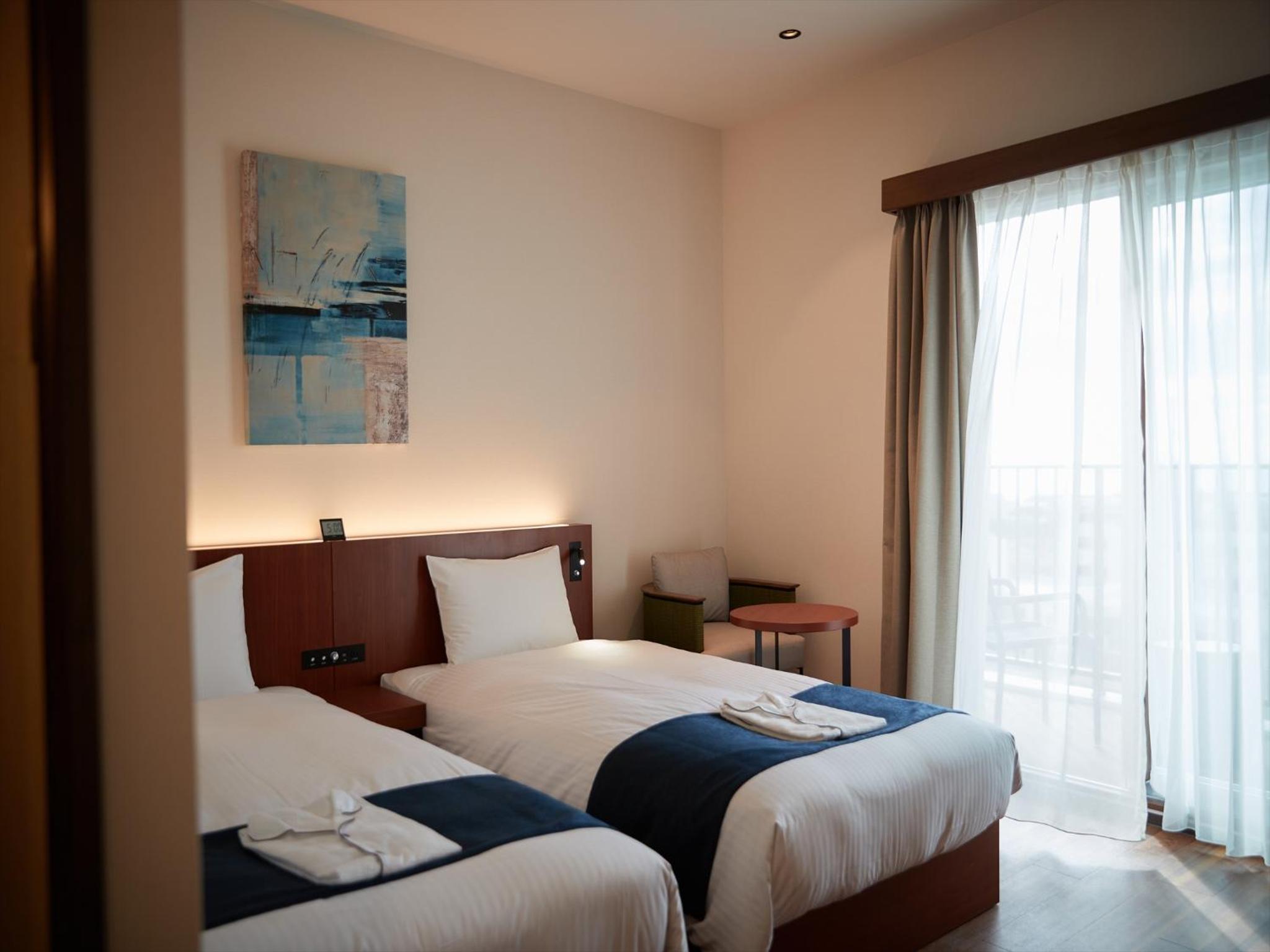 Deluxe Twin Room - Photo 25
