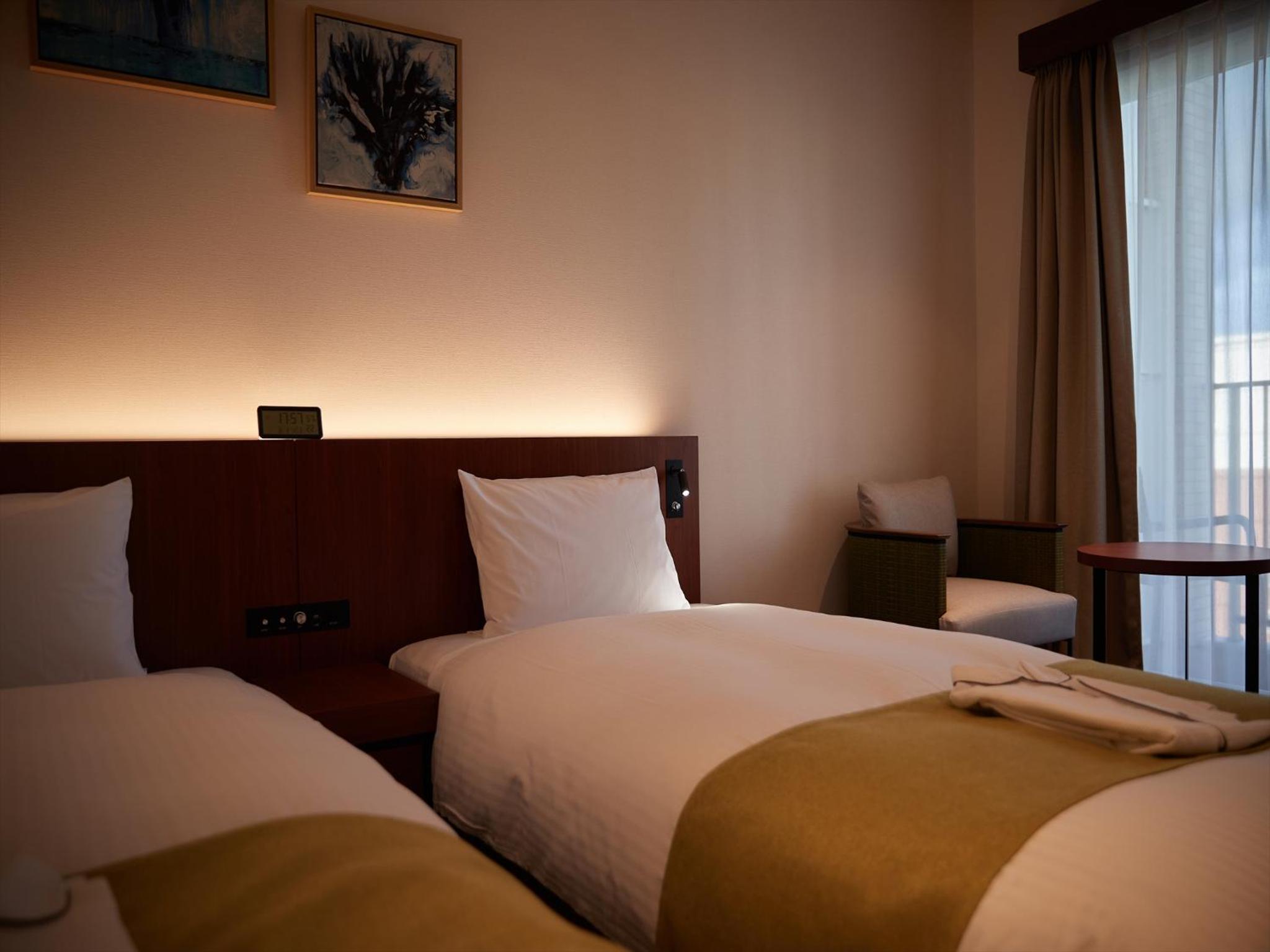 Standard Twin Room - Photo 10