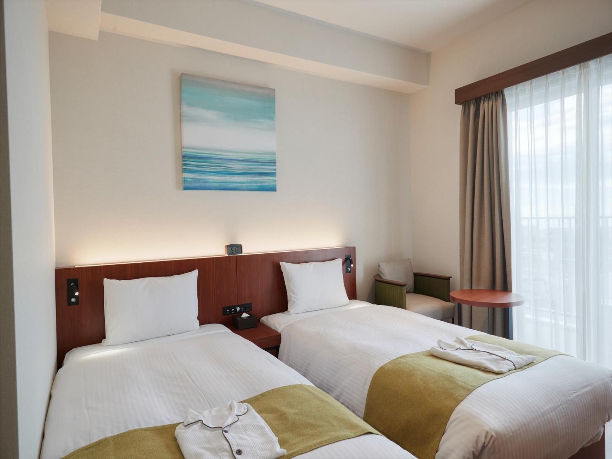 Standard Twin Room - Photo 7