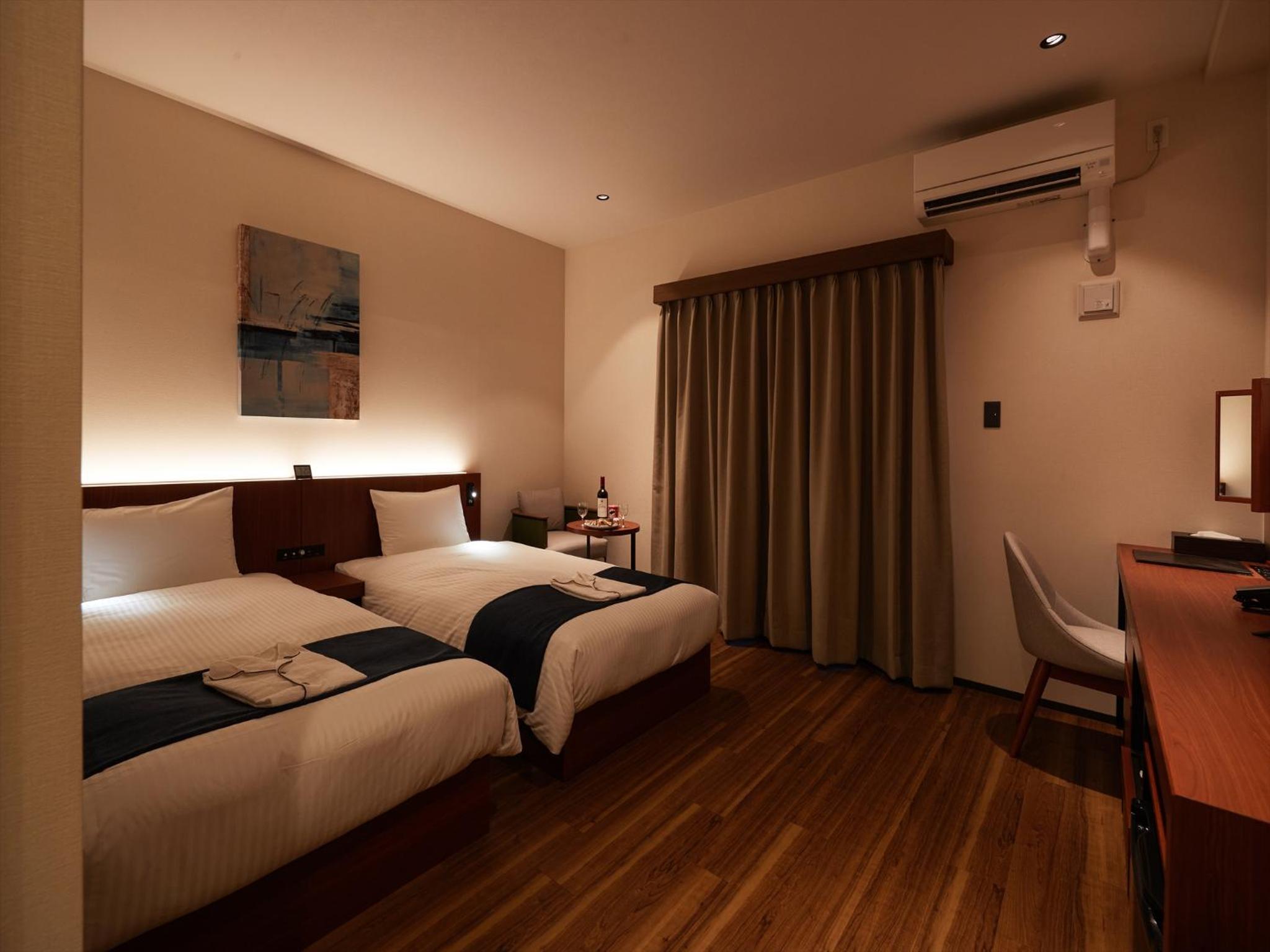 Deluxe Twin Room - Photo 8