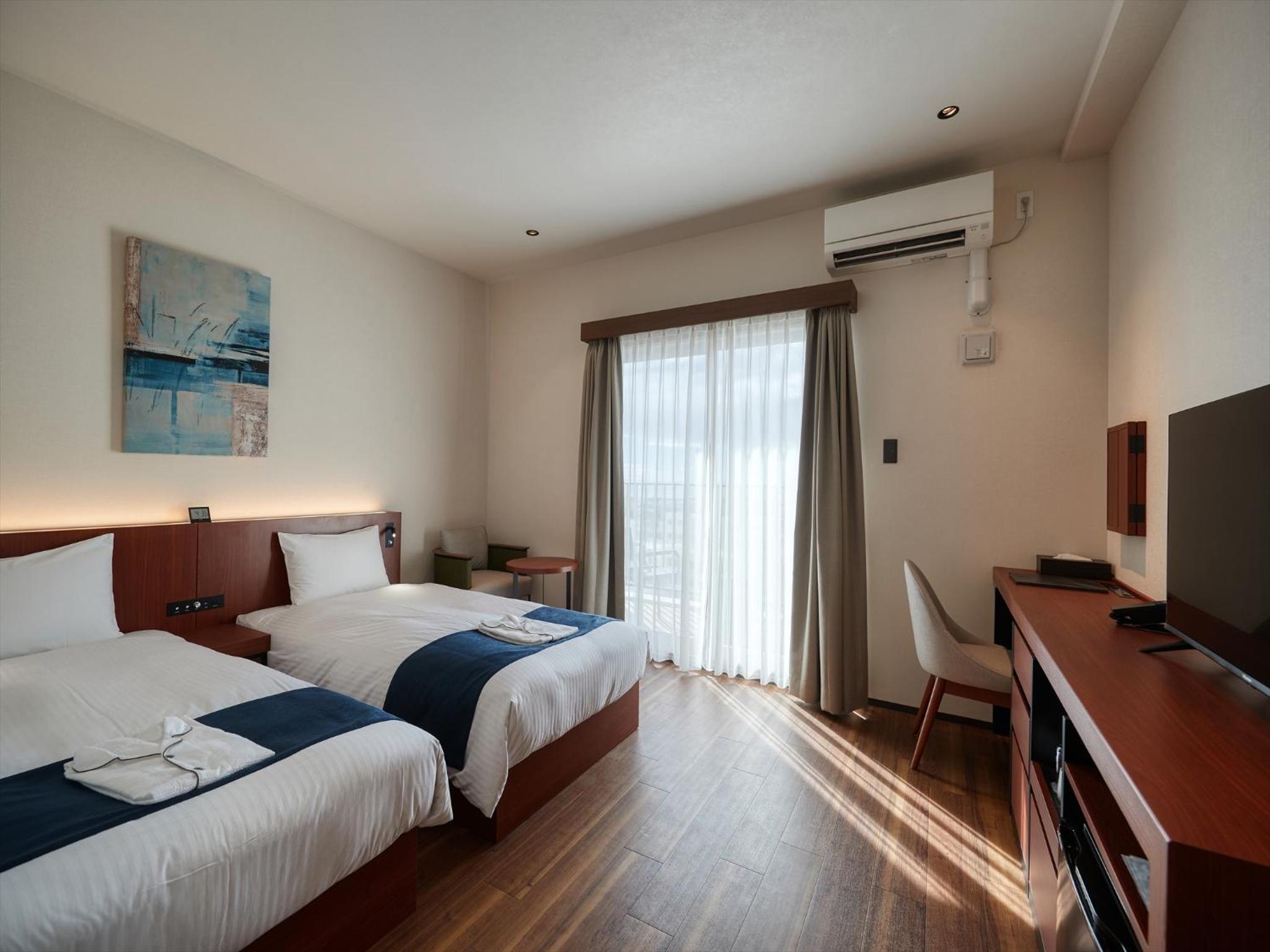 Deluxe Twin Room - Photo 11