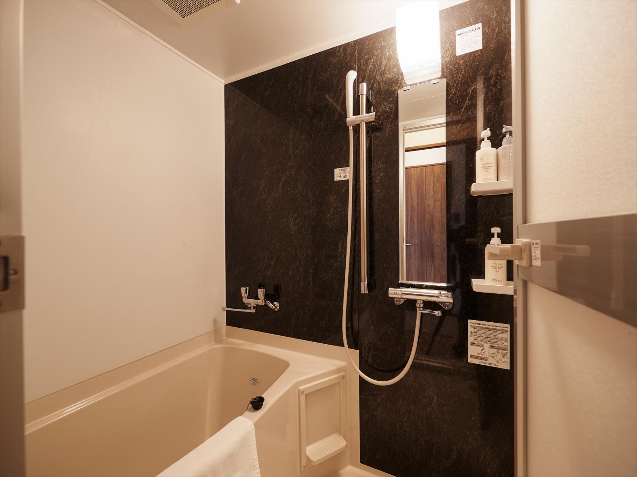 Deluxe Twin Room - Photo 10