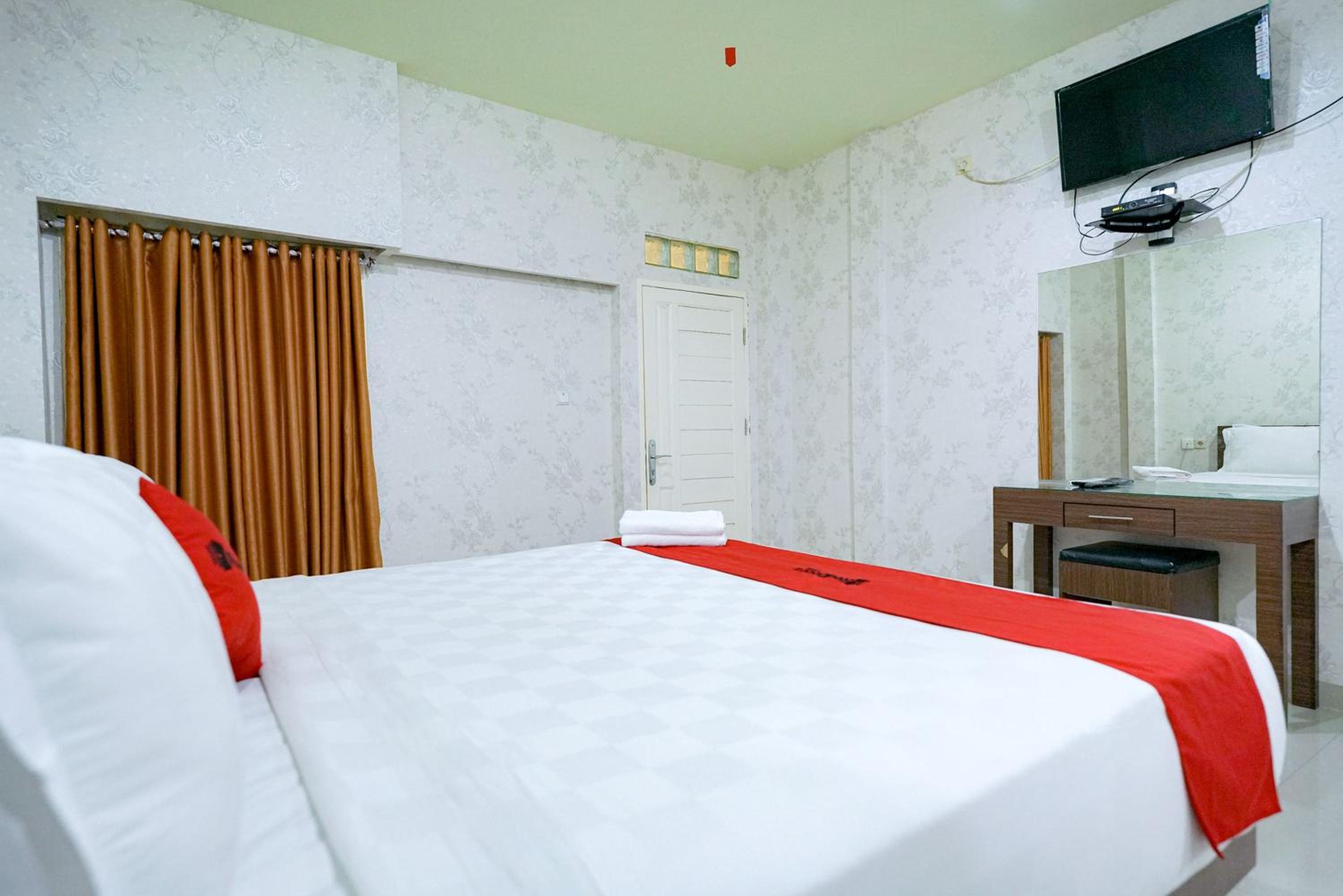 Deluxe Room - Photo 4