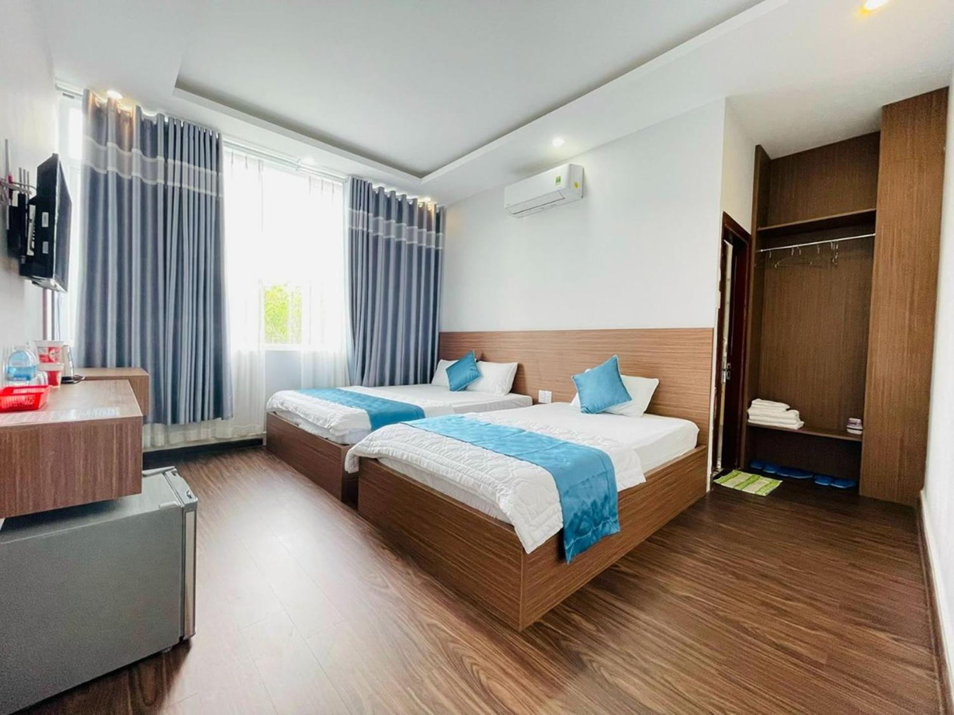 Quadruple Room with Balcony - Photo 1