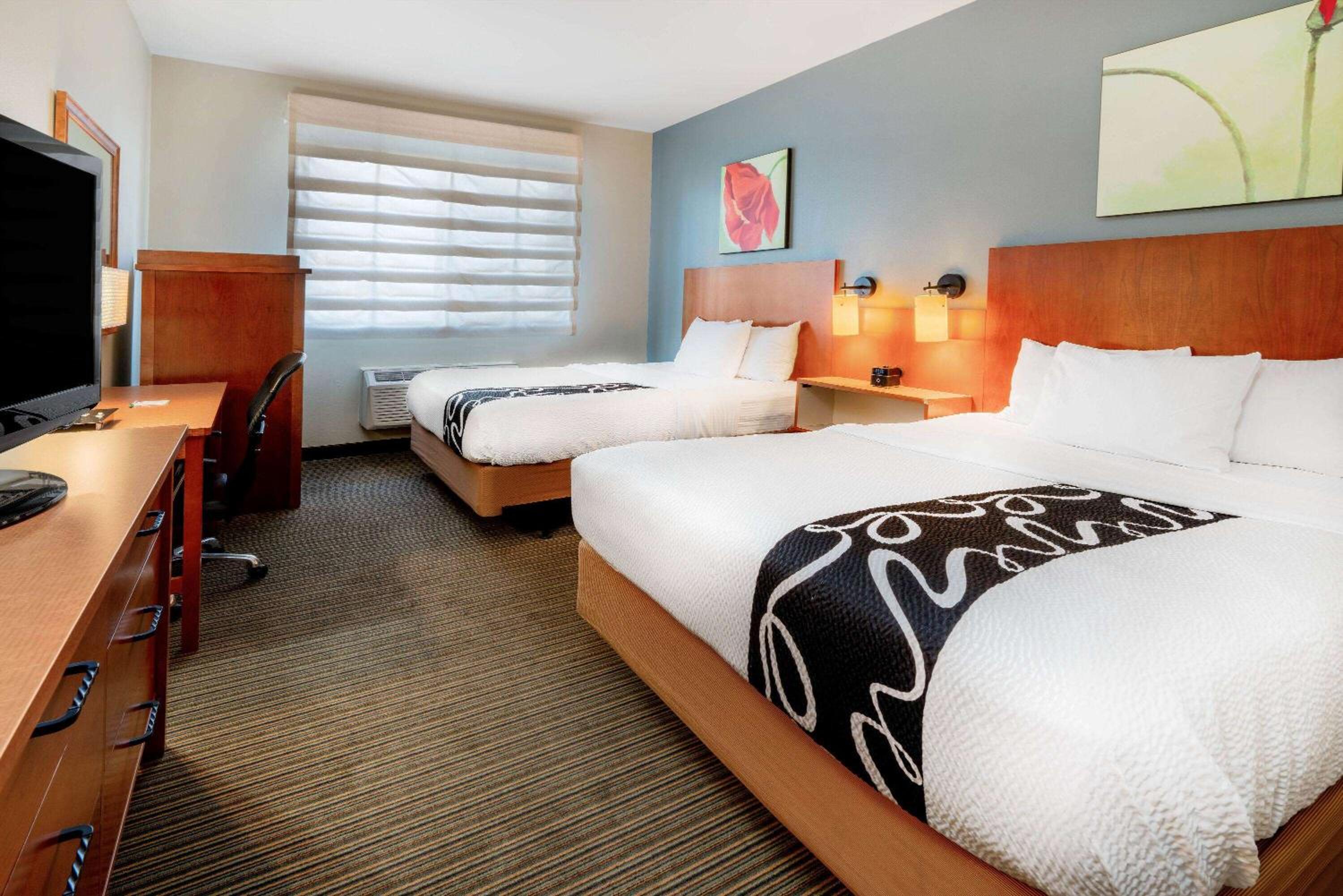 Deluxe Queen Room with Two Queen Beds - Photo 1