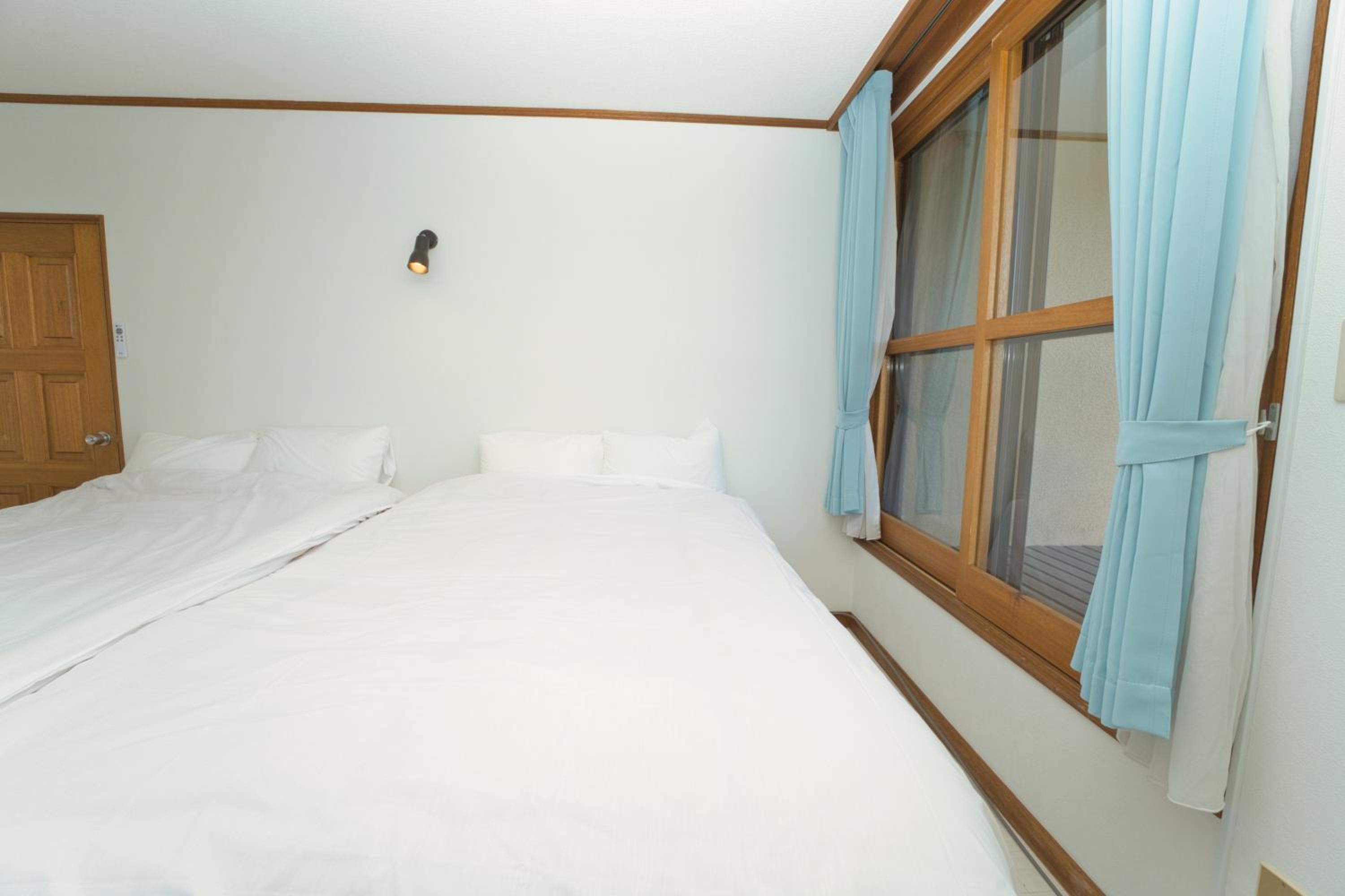 Three-Bedroom House - Photo 36