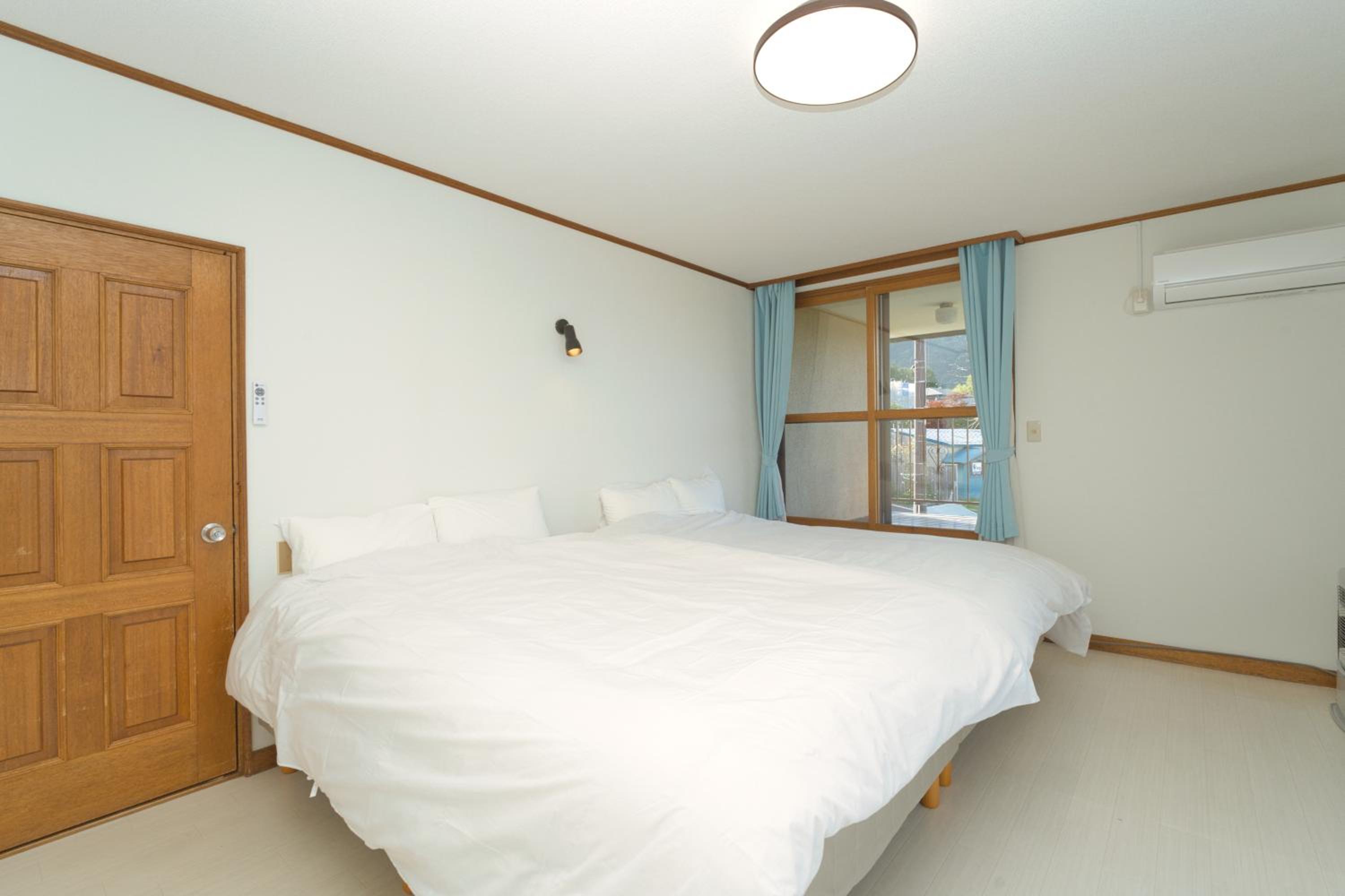Three-Bedroom House - Photo 35