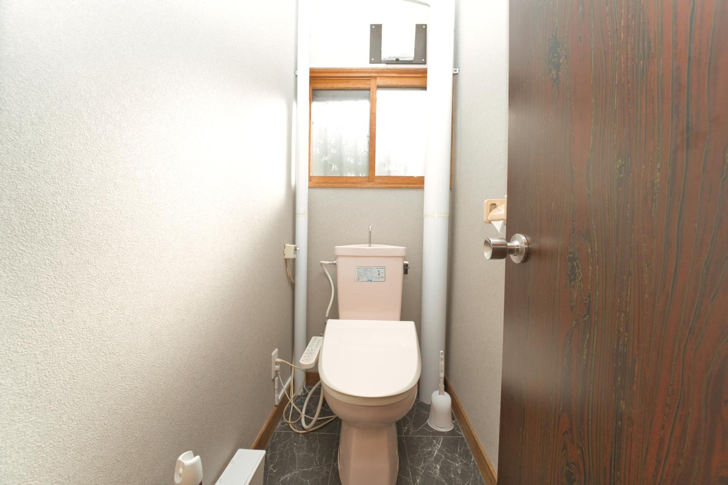 Three-Bedroom House - Photo 32