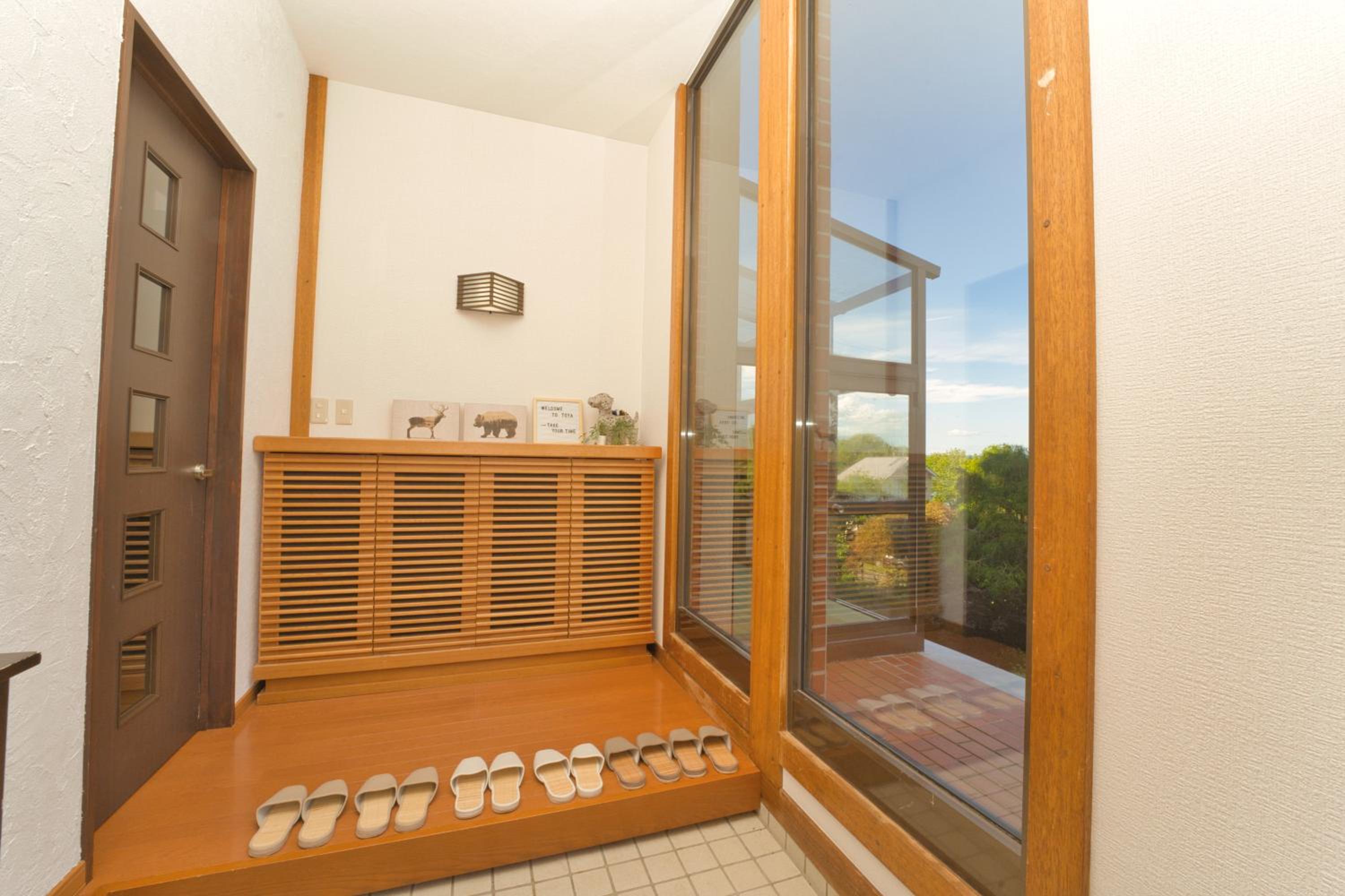 Three-Bedroom House - Photo 31