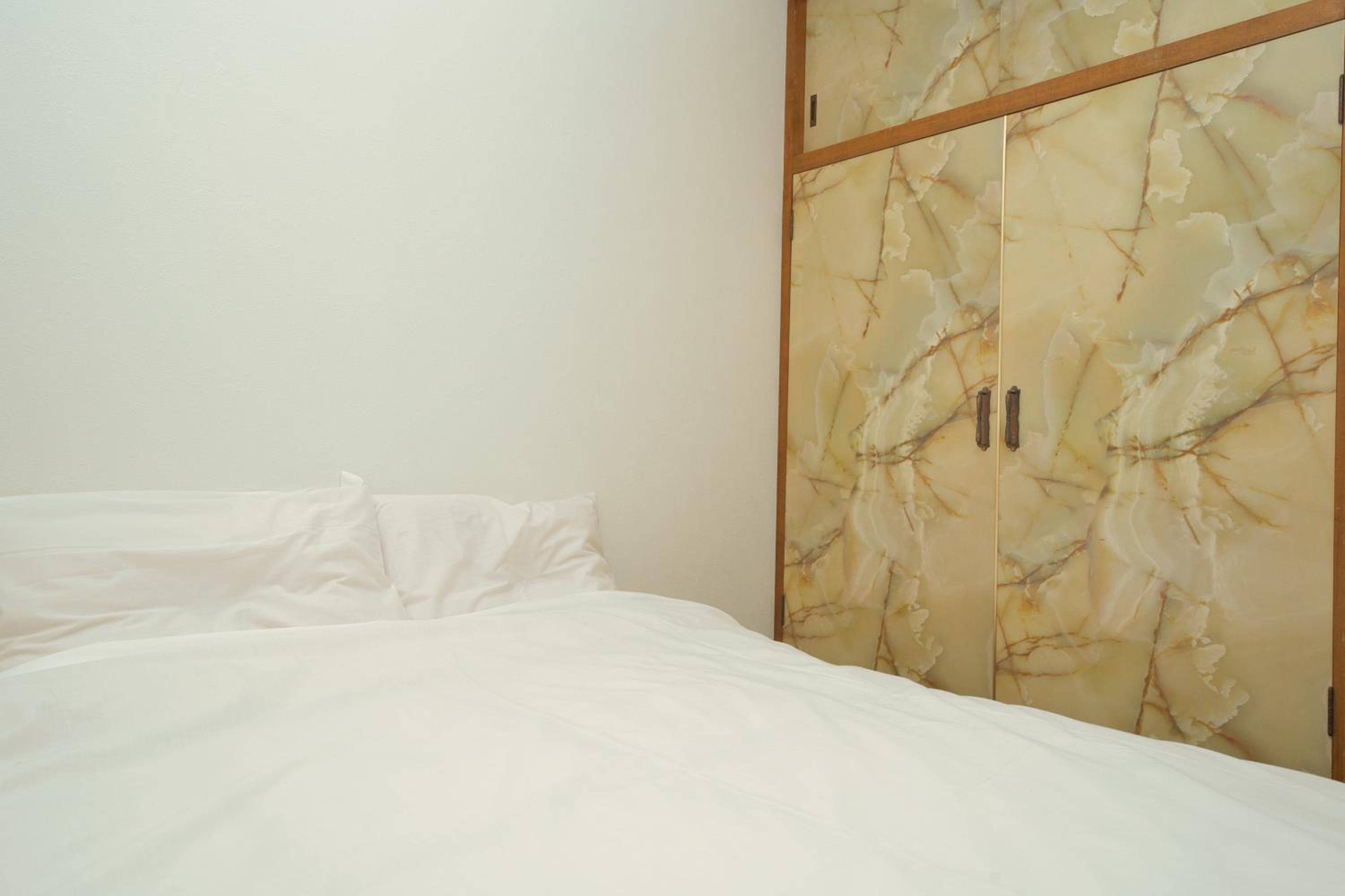 Three-Bedroom House - Photo 27