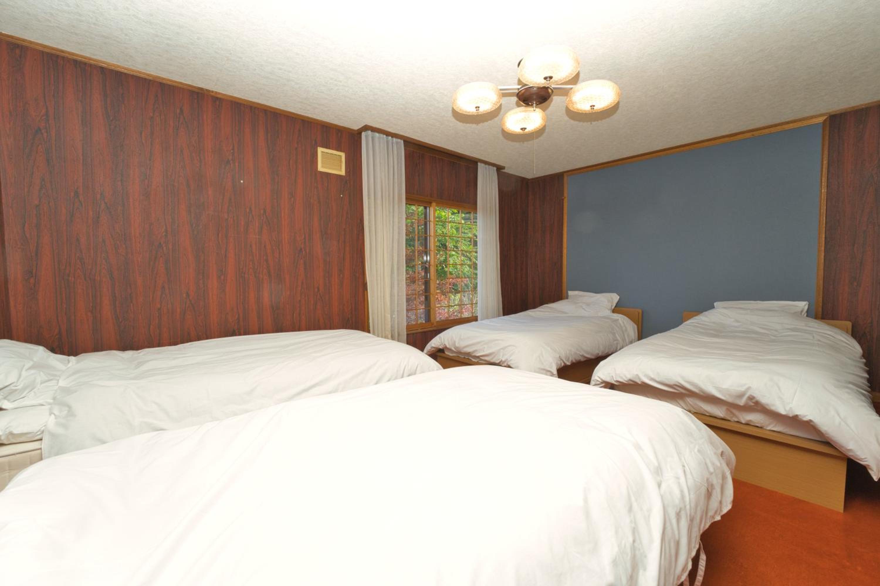 Three-Bedroom House - Photo 24