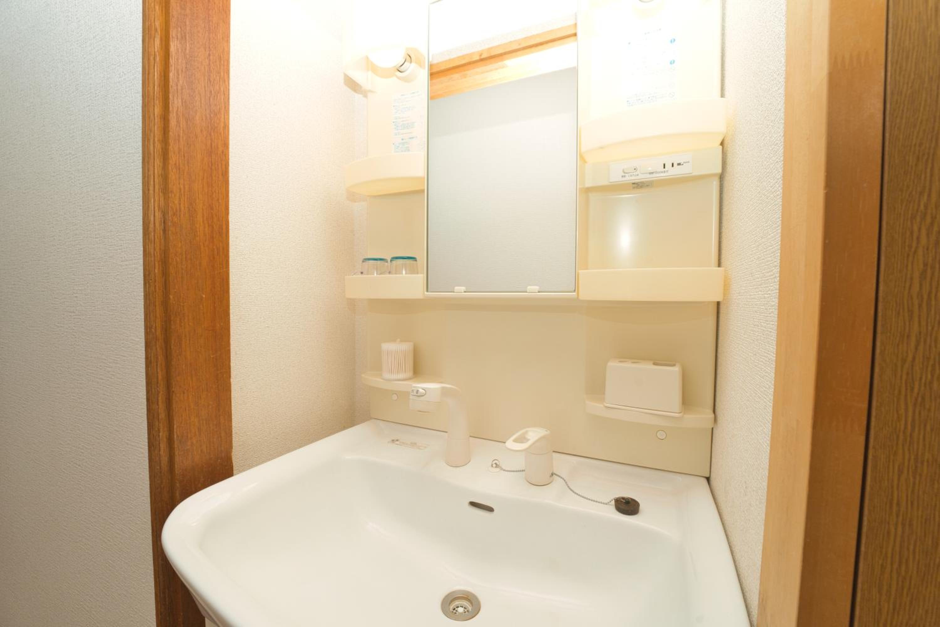 Three-Bedroom House - Photo 21