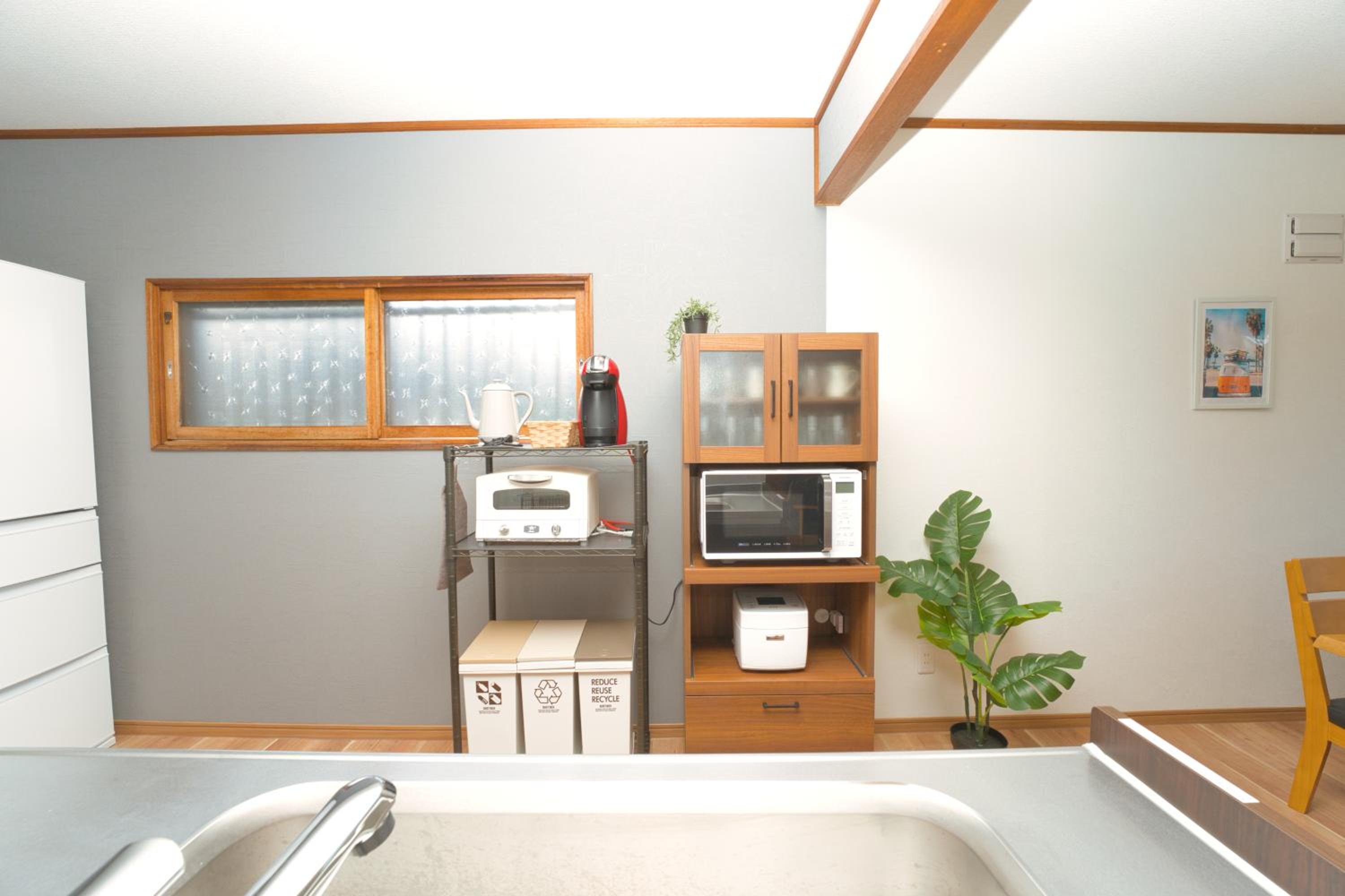 Three-Bedroom House - Photo 16