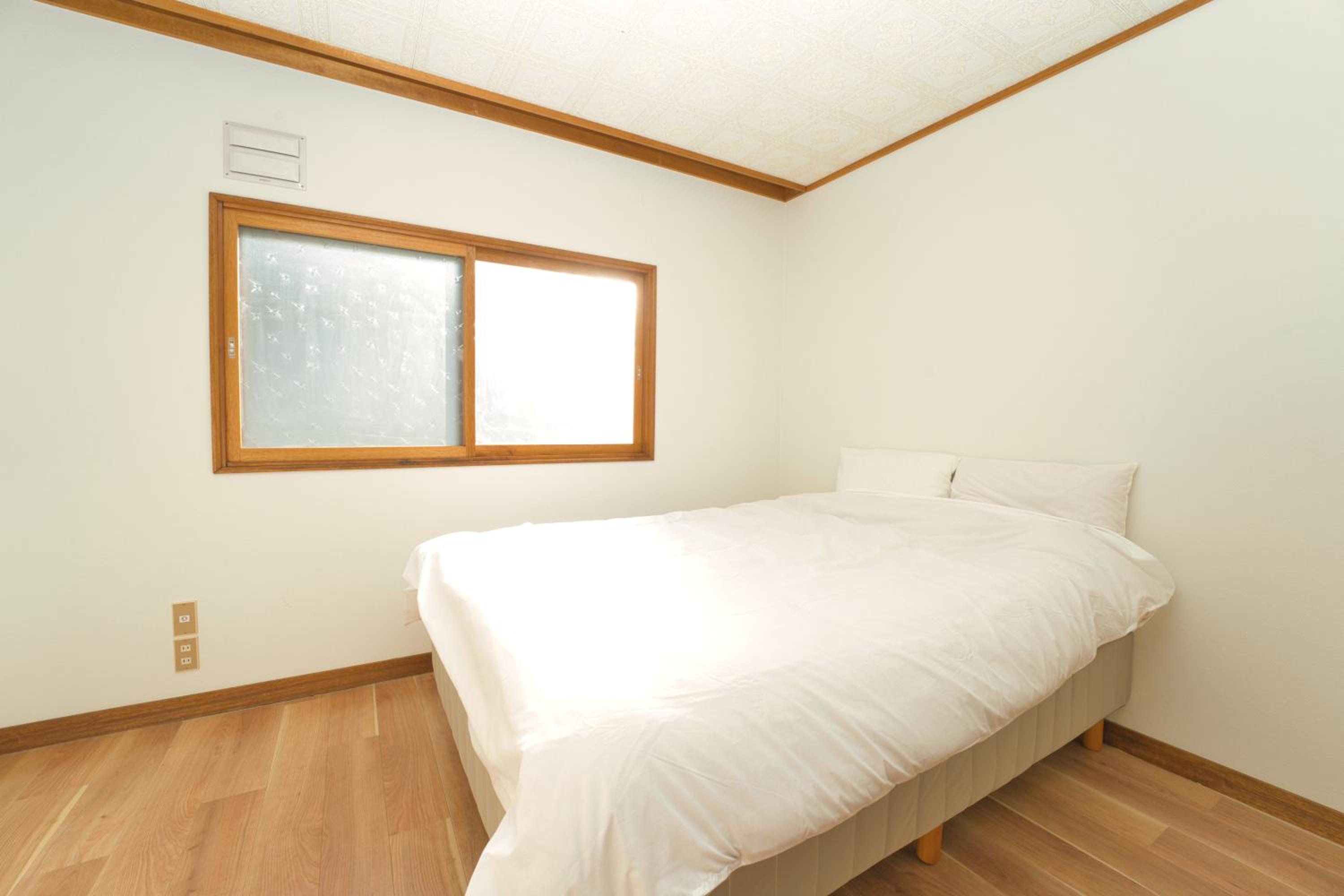 Three-Bedroom House - Photo 10