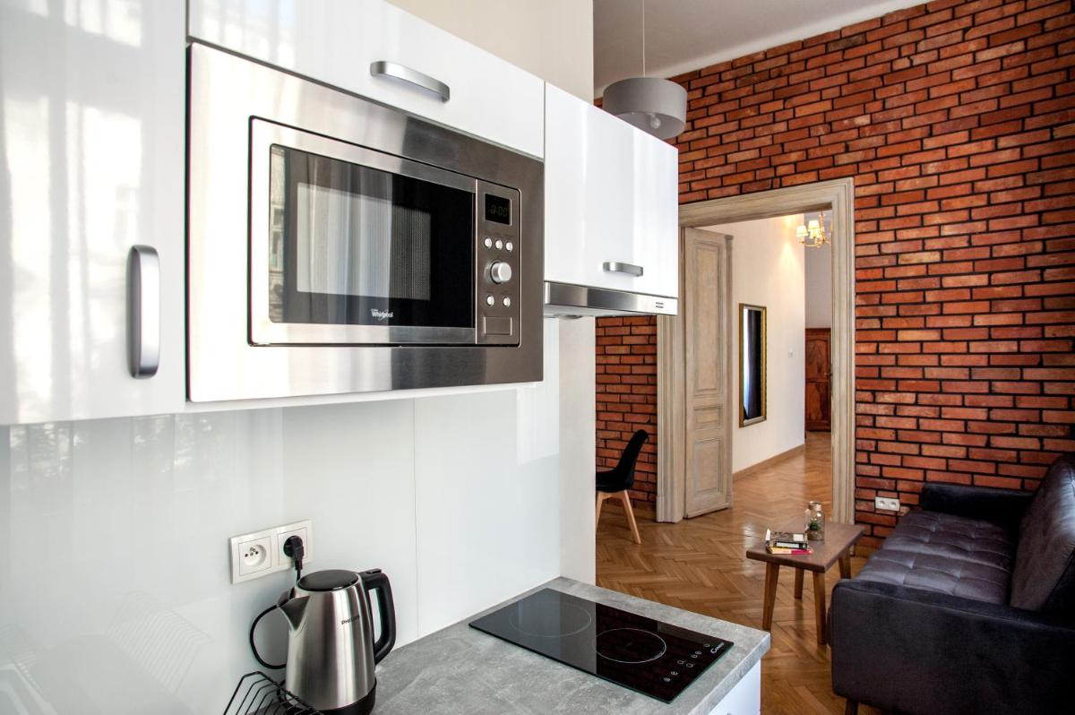 King Suite with Balcony - Photo 1