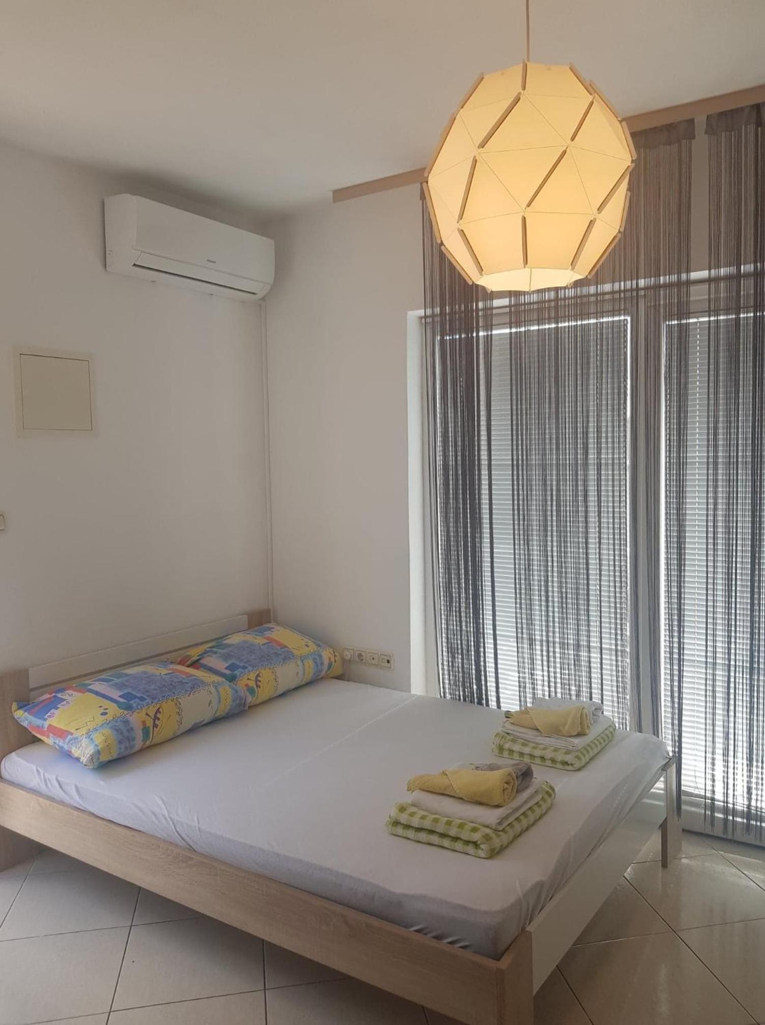 One-Bedroom Apartment with Balcony and Sea View