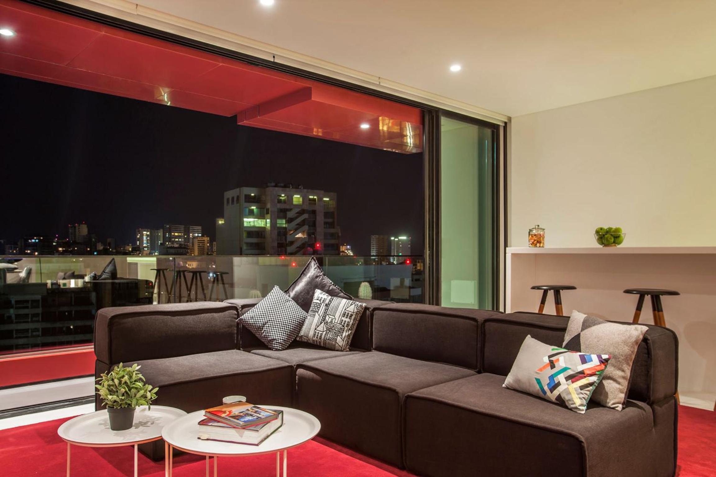Two-Bedroom Duplex Apartment with City View