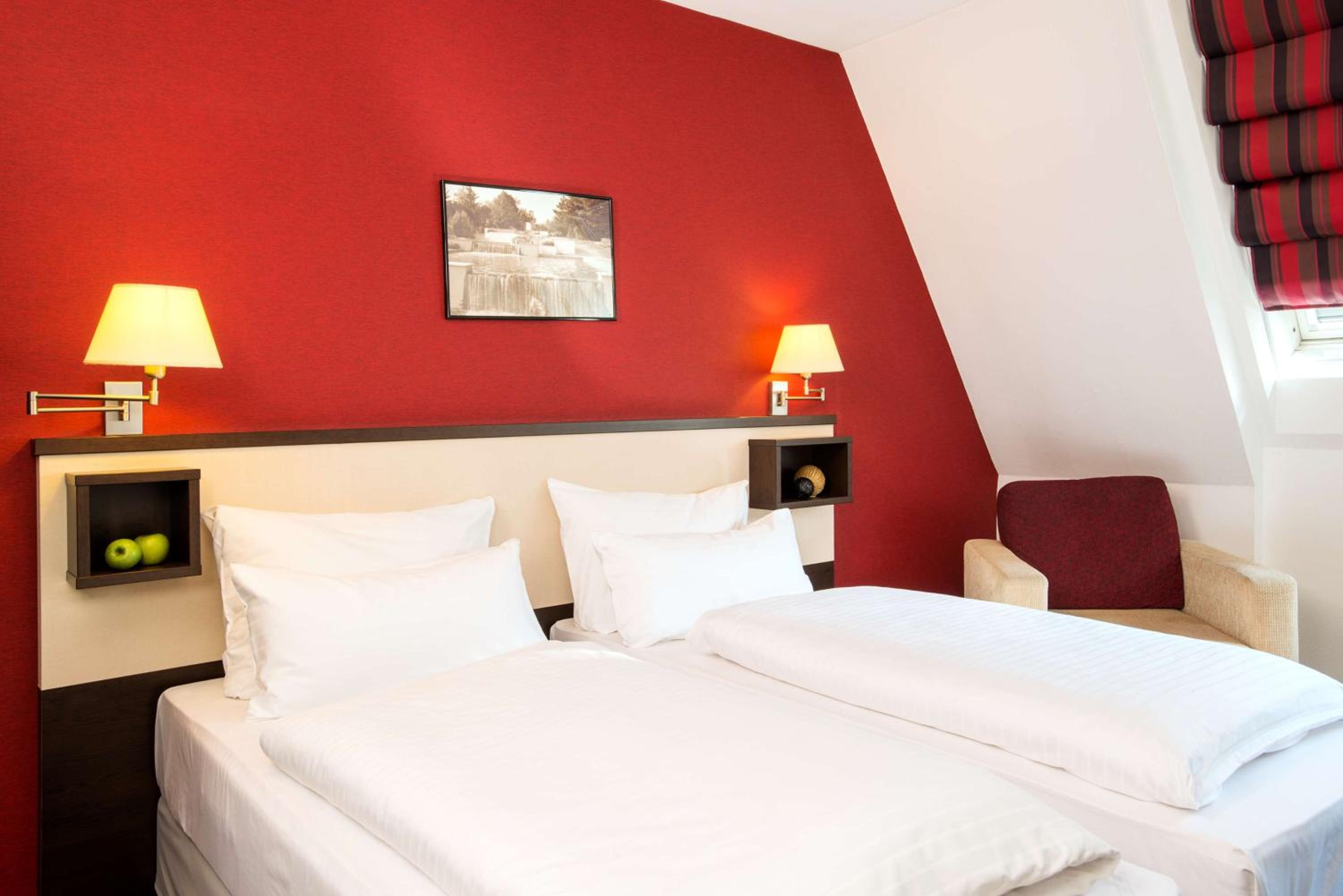 Family Adjoining Room (3 Adults + 1 Child)