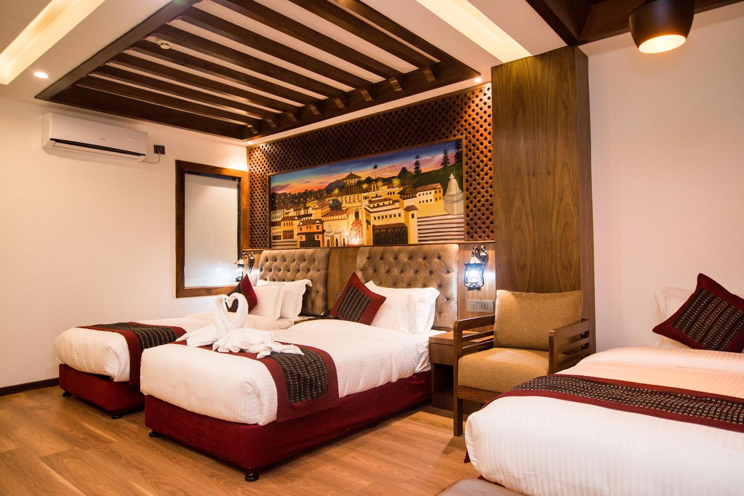 Deluxe Triple Room - Photo 1