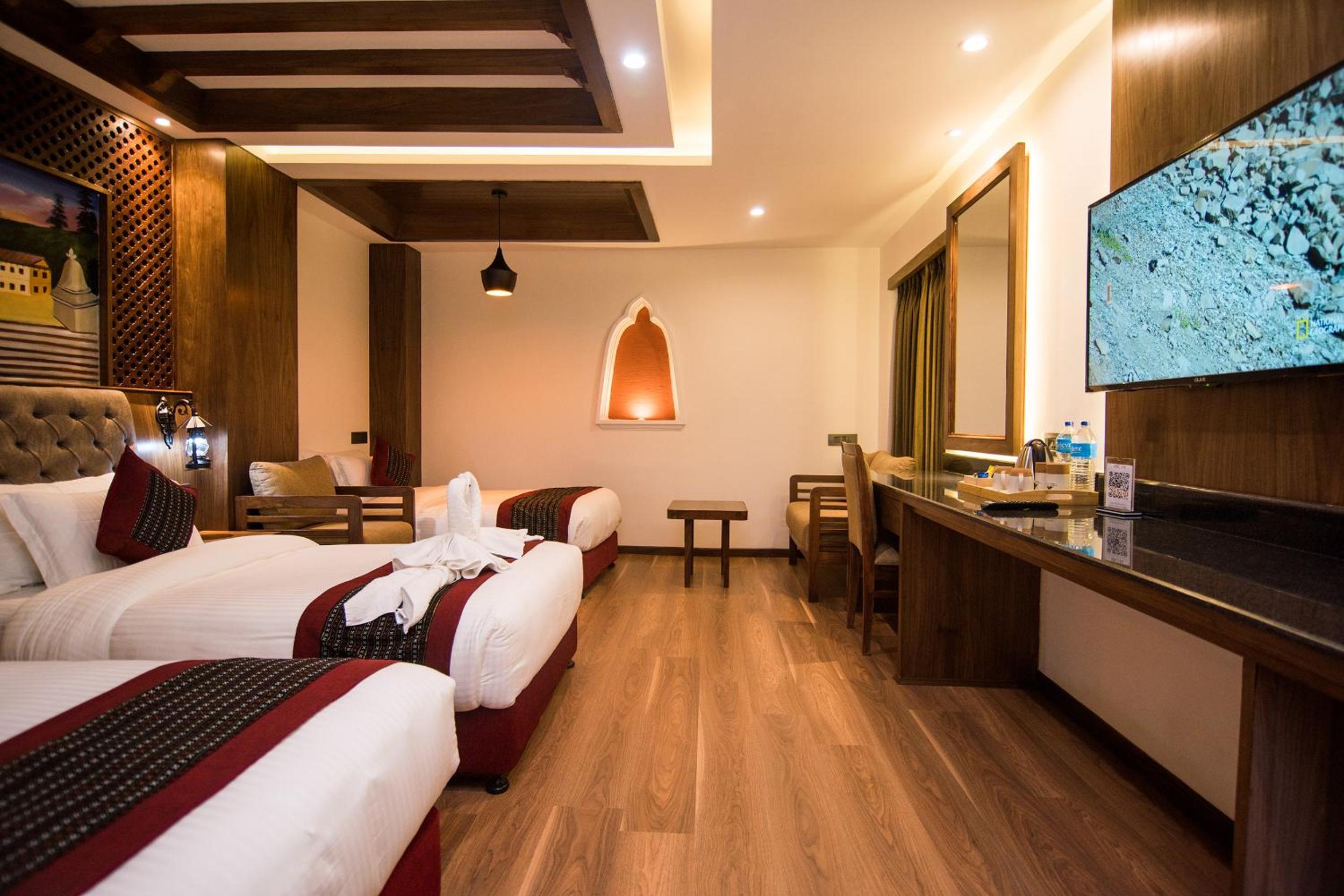Deluxe Triple Room - Photo 2