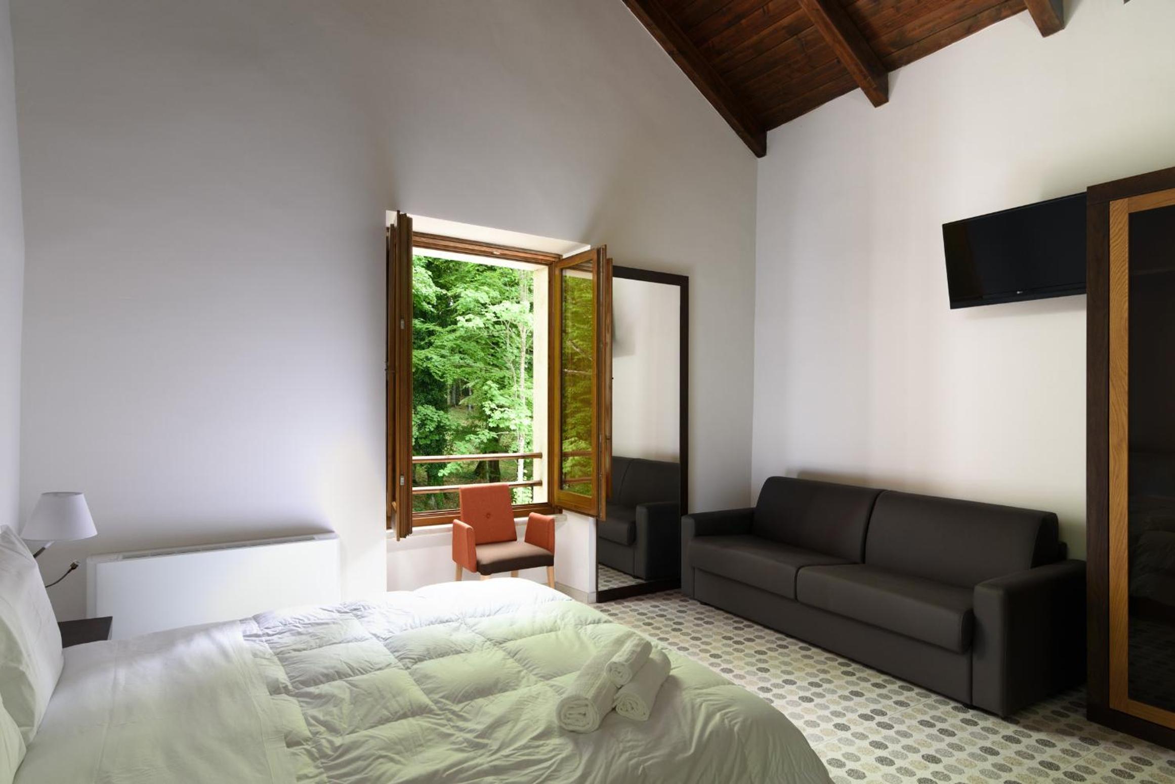 Comfort Quadruple Room - Photo 16