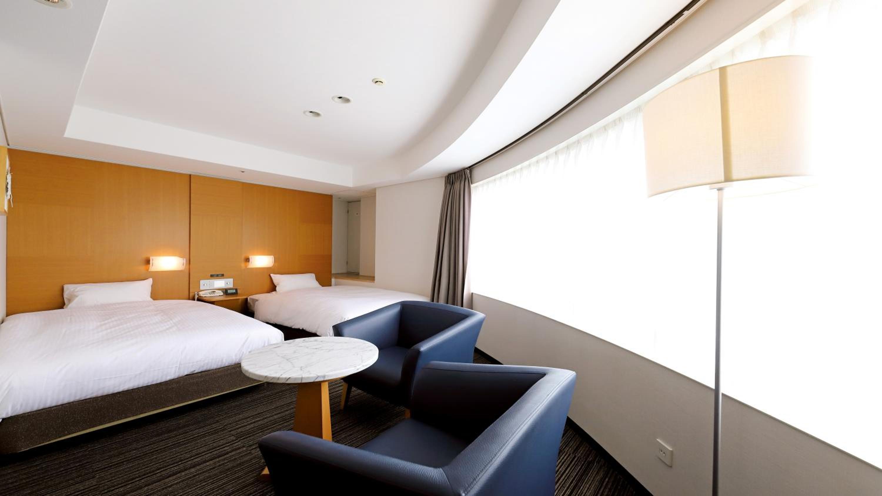 Deluxe Twin Room - Non-Smoking - No Daily Cleaning photo 1