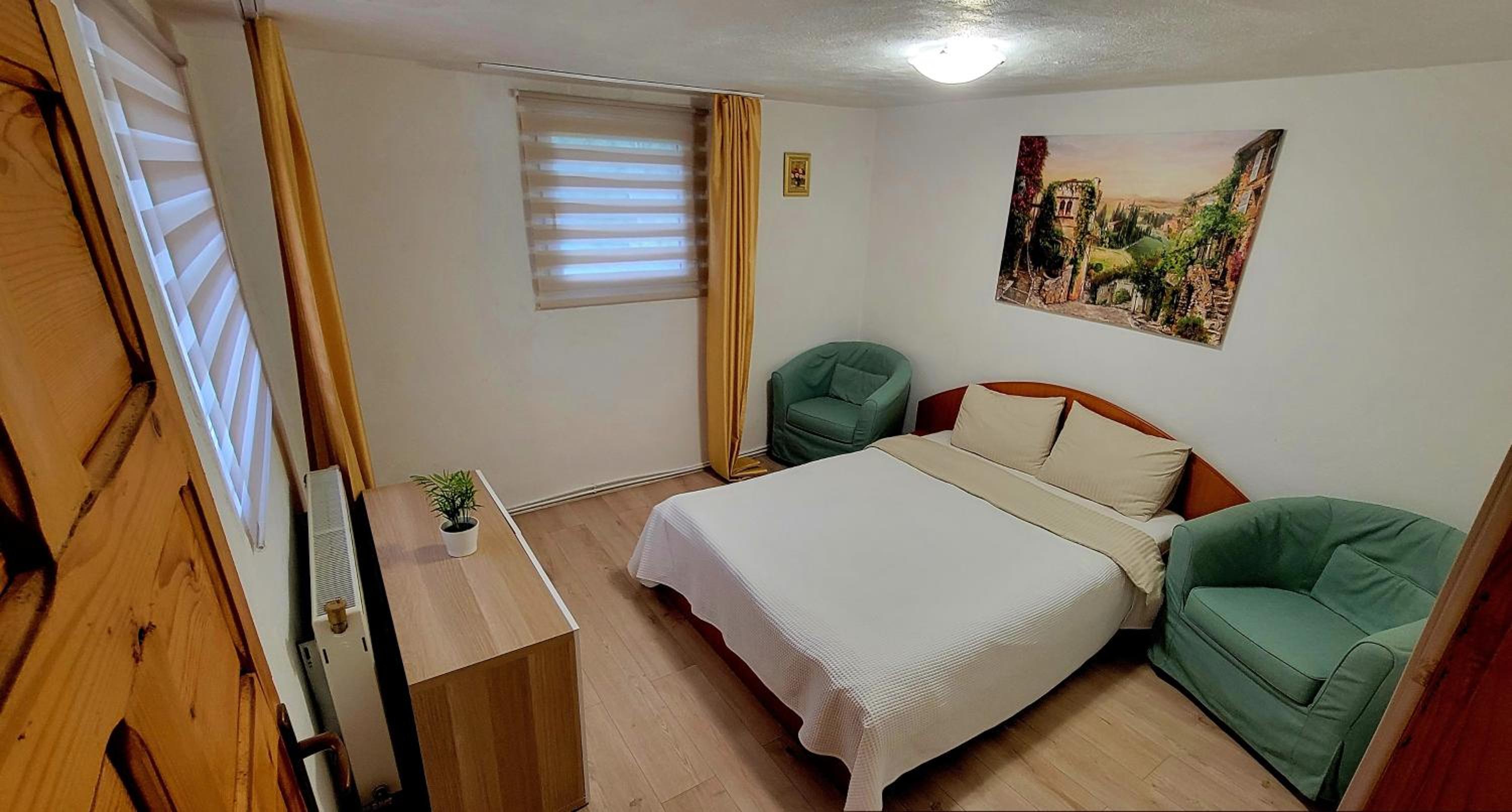 Three-Bedroom House - Photo 28