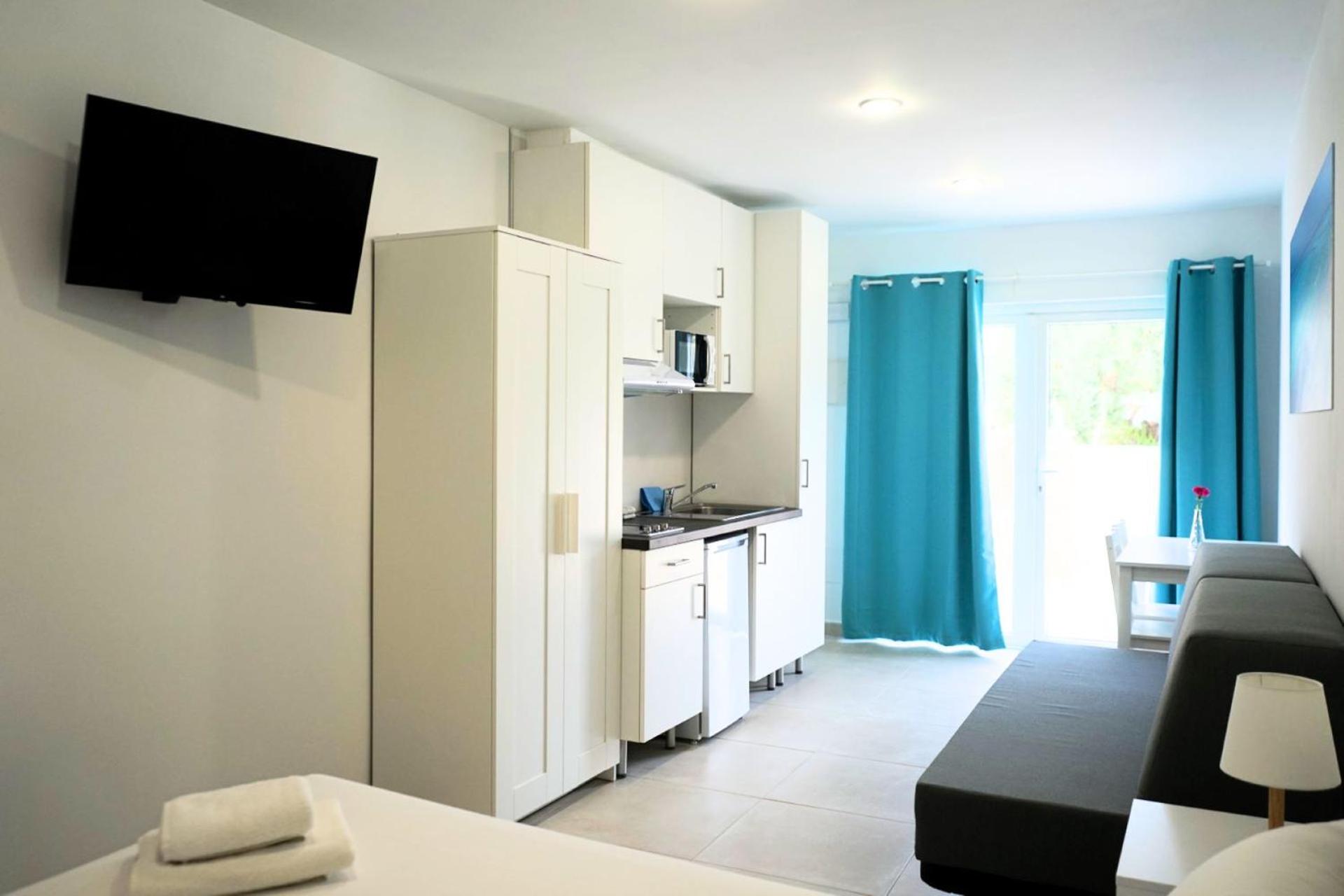 Ground Floor Studio with Terrace and Kitchen (2-3 Adults)