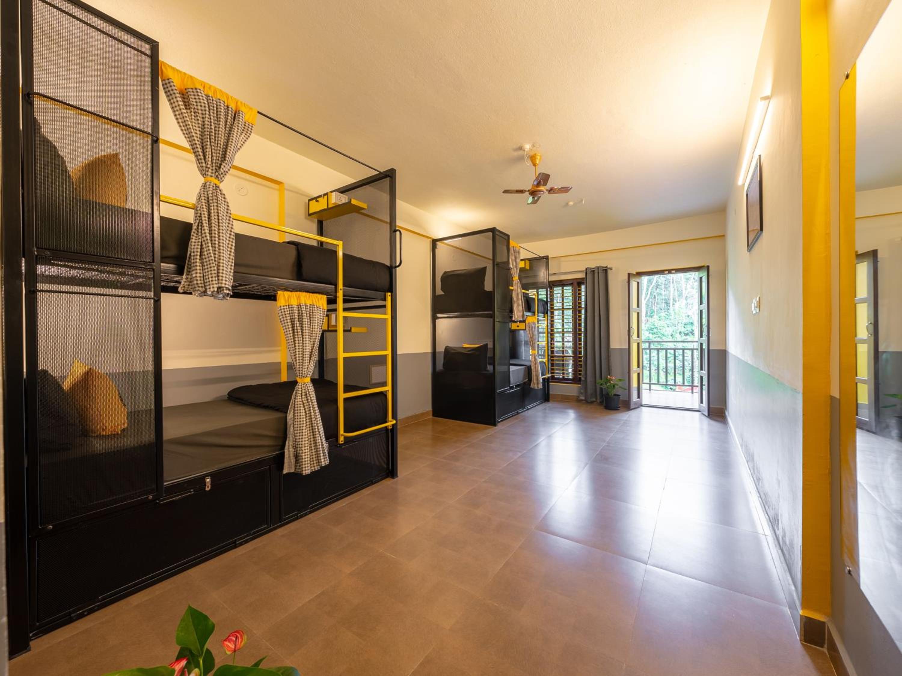 Bed in 4 Bed Mixed Dormitory with Balcony and Rainforest View photo 1