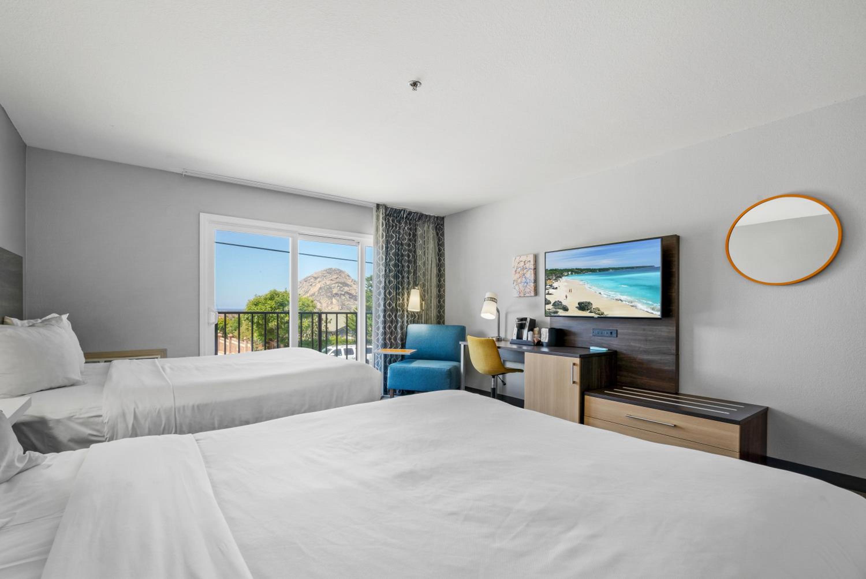 Queen Room with 2 Queen Beds Partial Ocean View - Photo 1