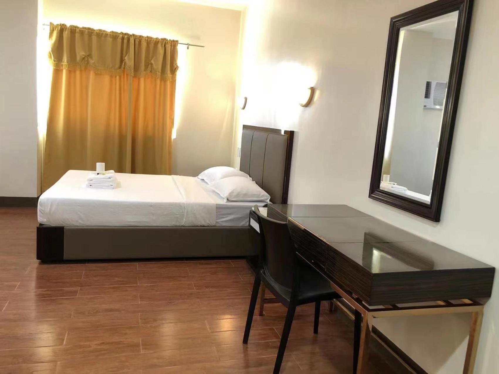 Deluxe Room - Photo 17