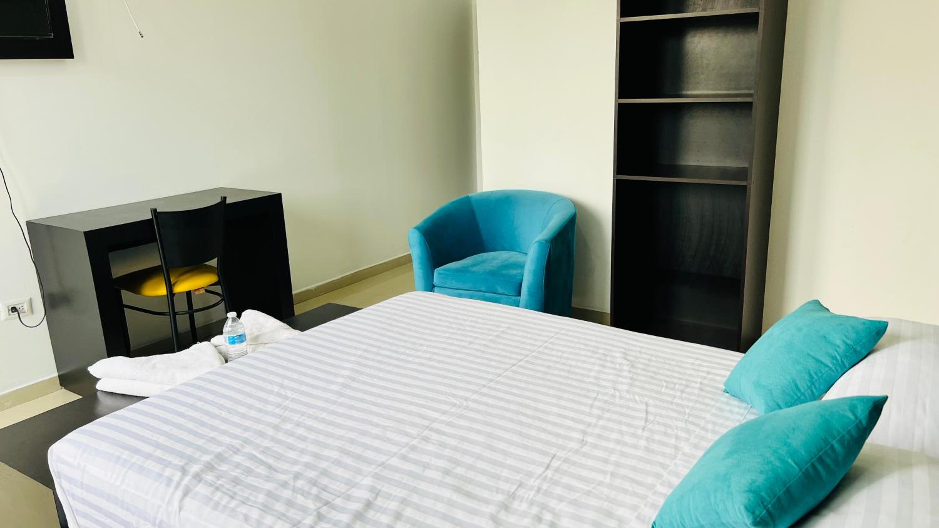Deluxe Double Room (2 Adults + 1 Child) - Photo 9