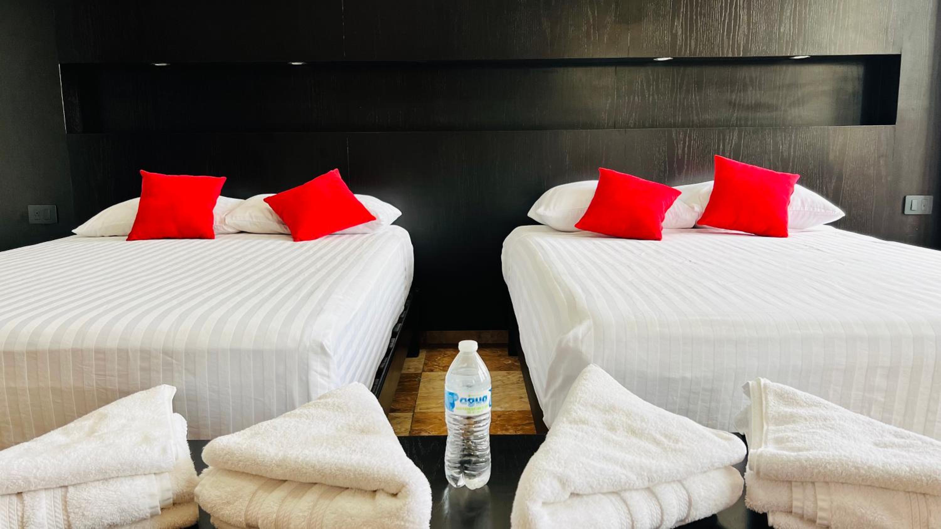 Deluxe Quadruple Room - Photo 4