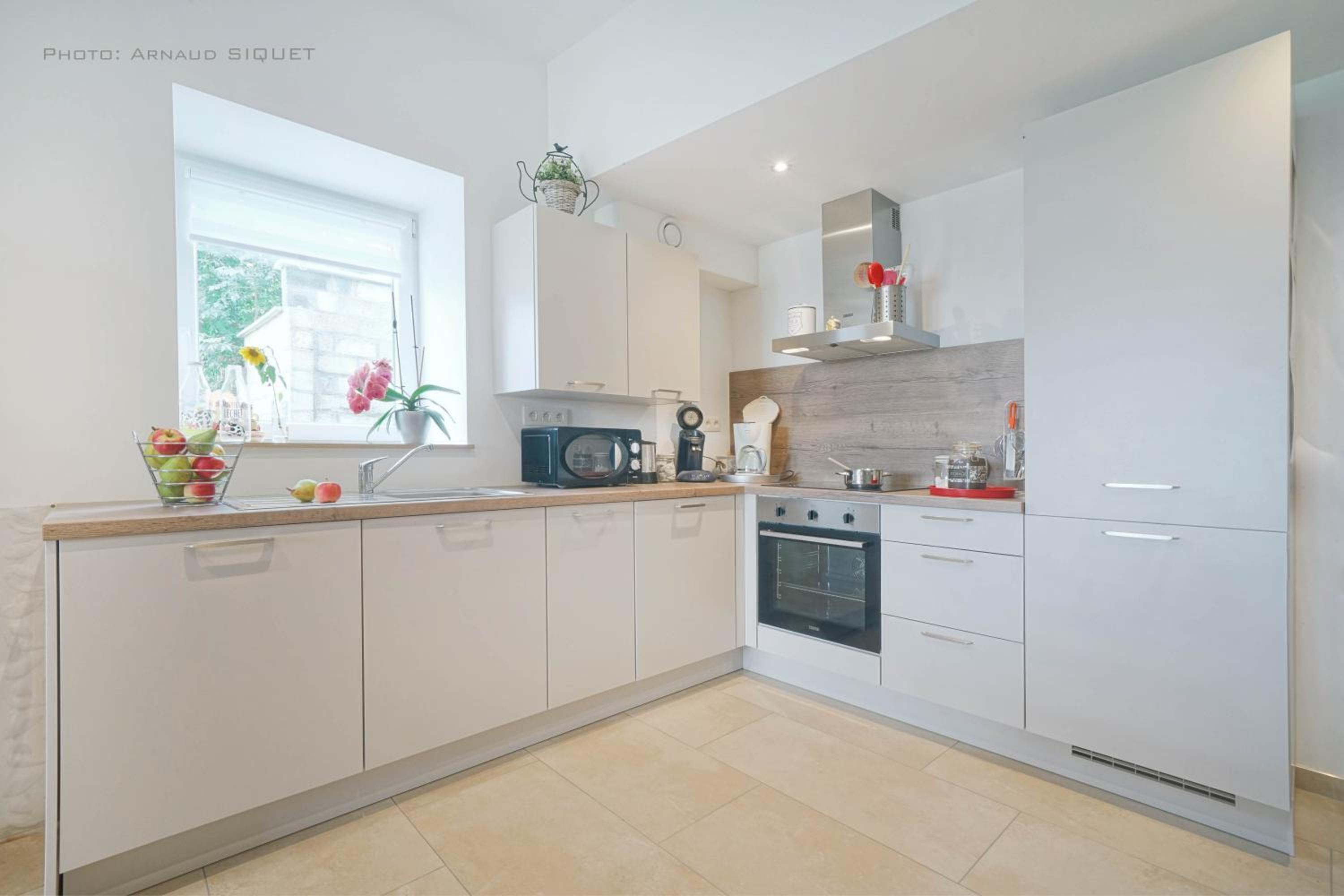Three-Bedroom House - Photo 20