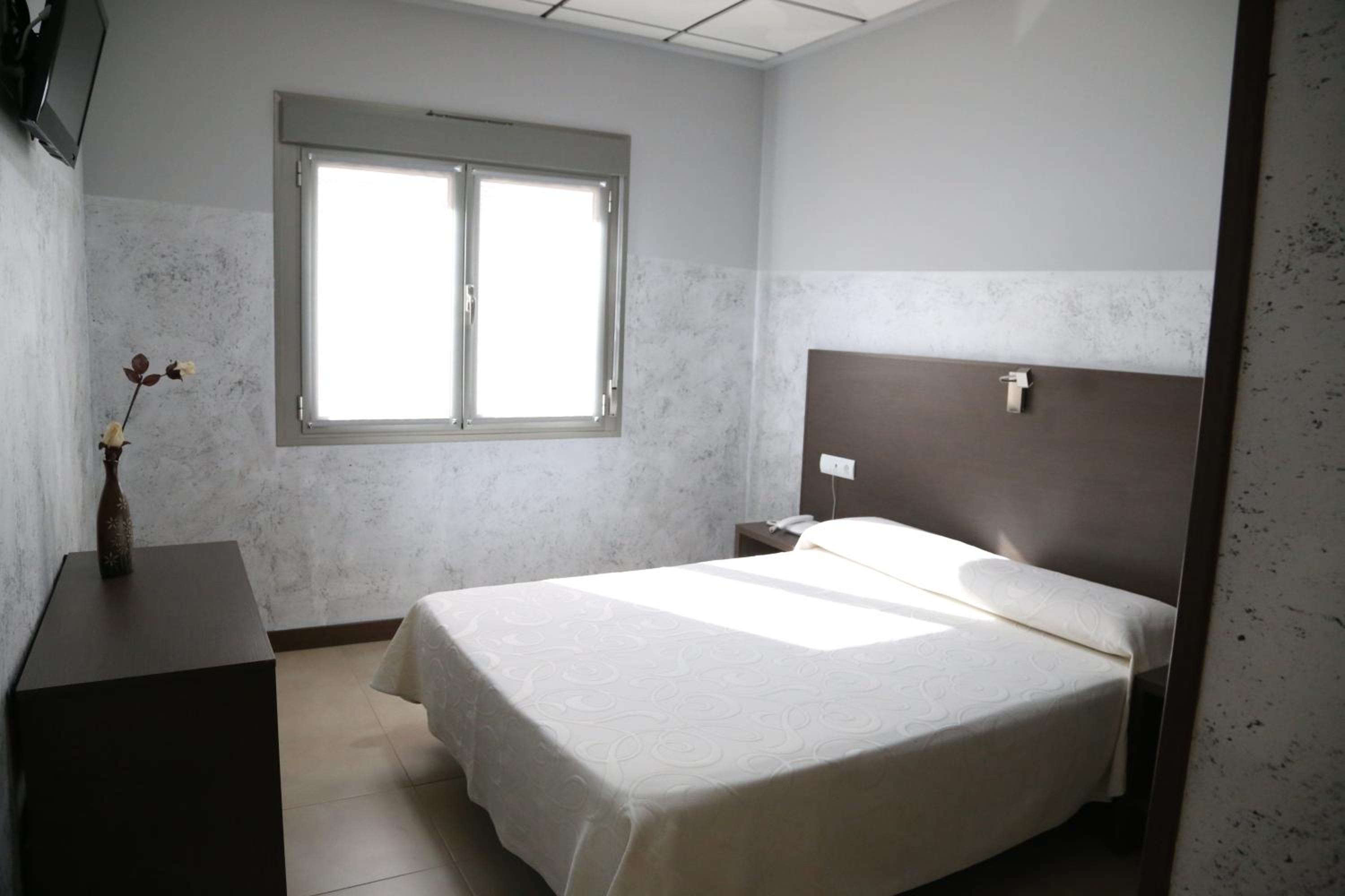 Habitación Doble Estándar o con Dos Camas Individuales.