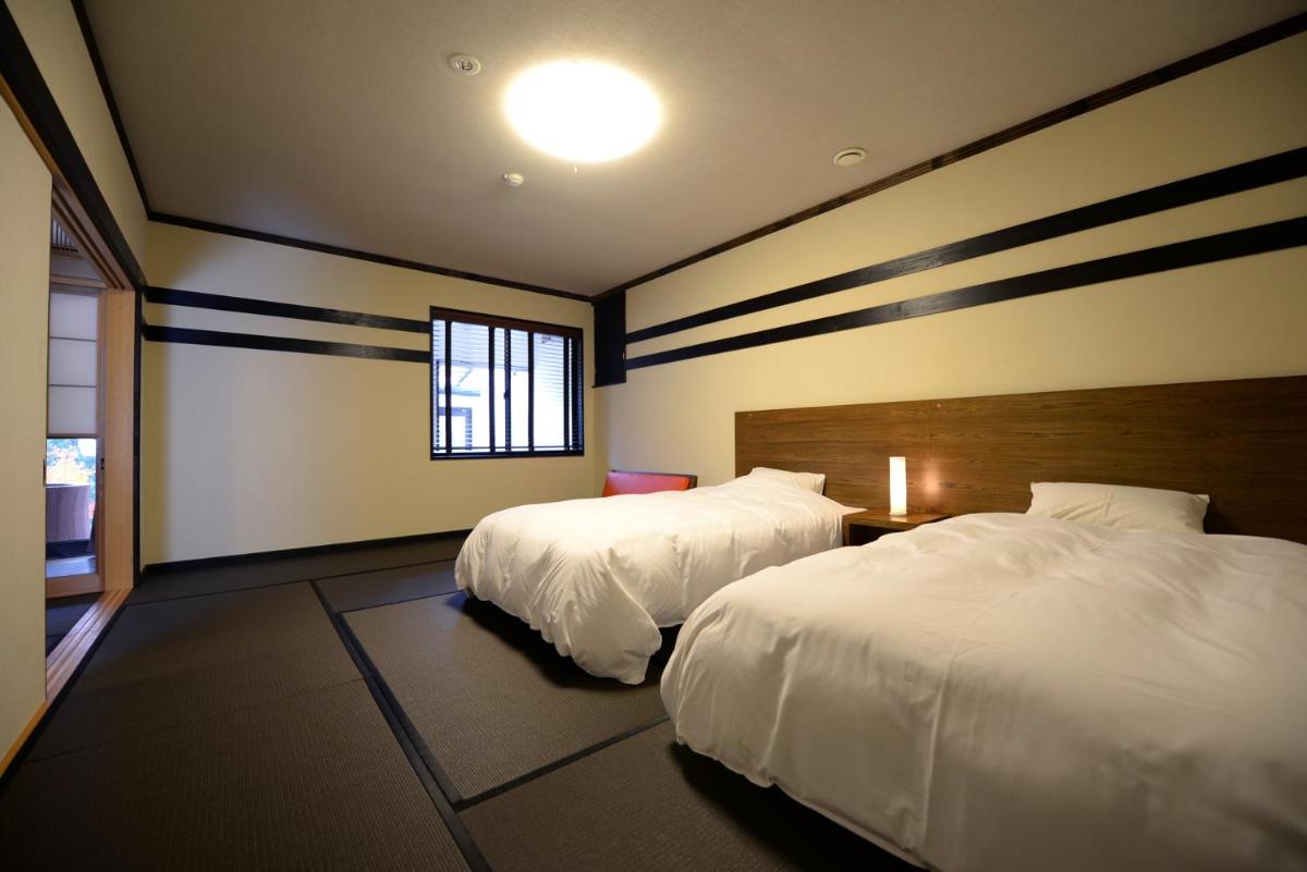 Twin Room with Tatami Area and Semi Open-Air Bath photo 2