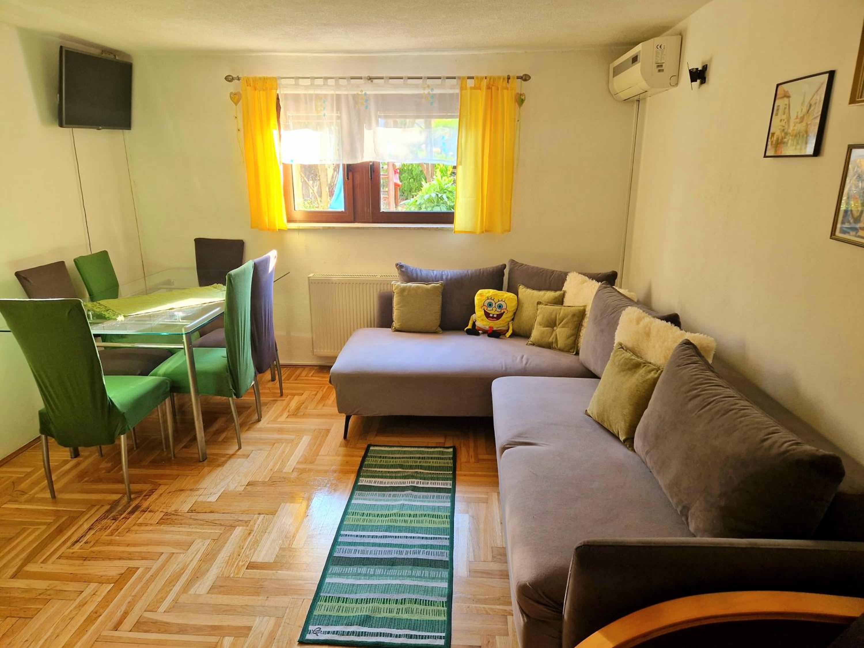 One-Bedroom Apartment with Terrace and Garden View