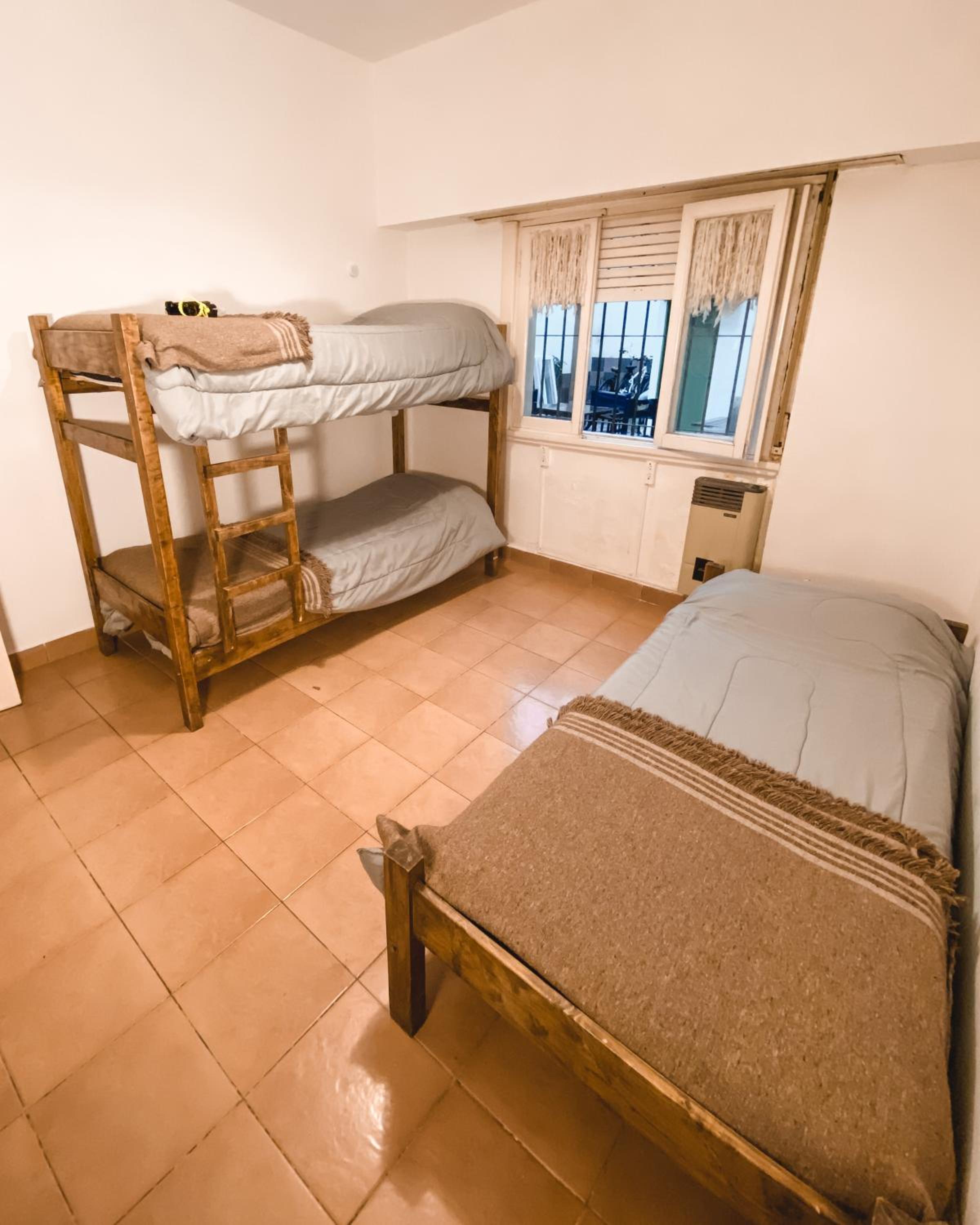 Basic Triple Room with Shared Bathroom photo 1