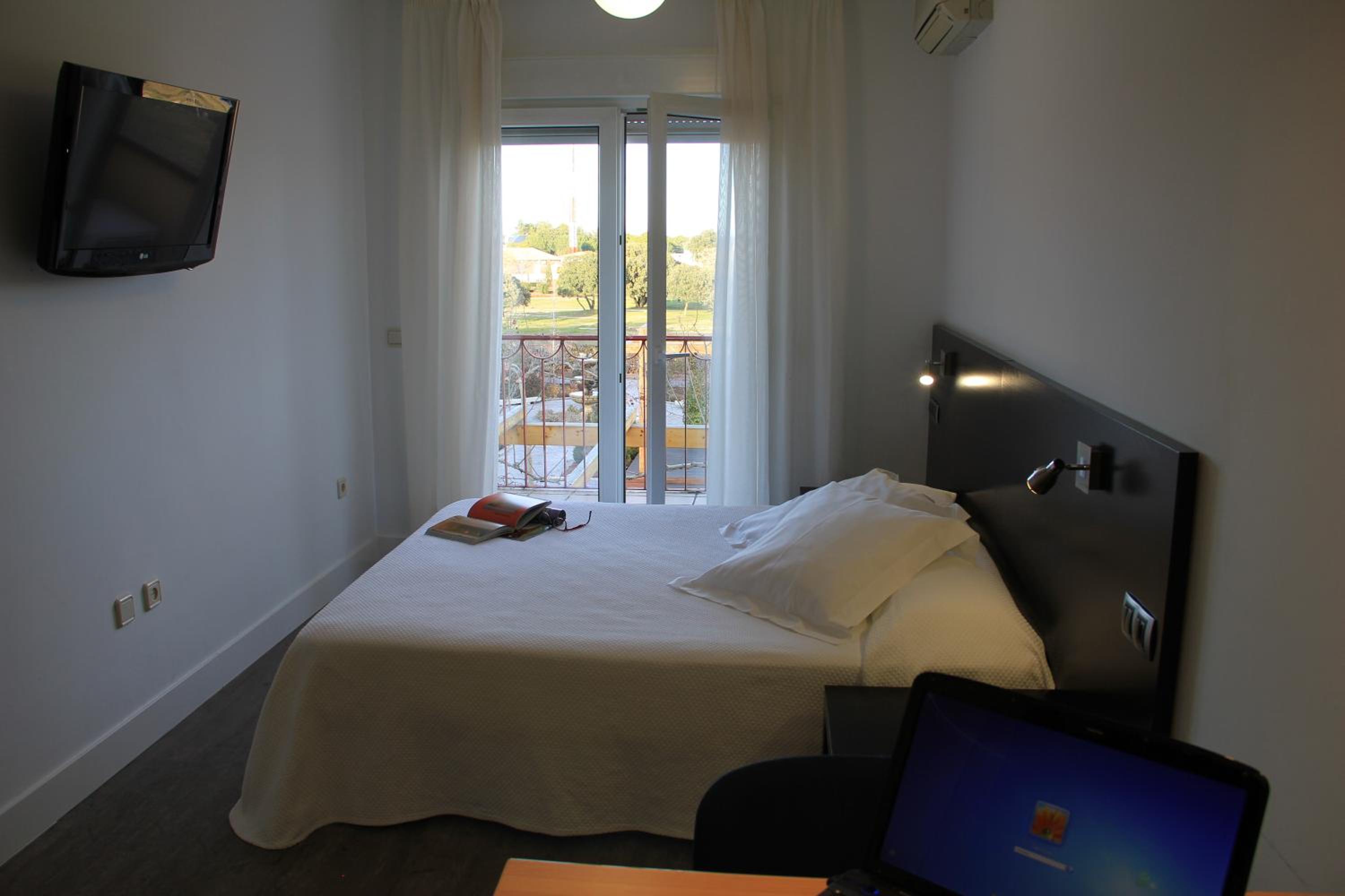One-Bedroom Apartment double bed with balcony photo 2