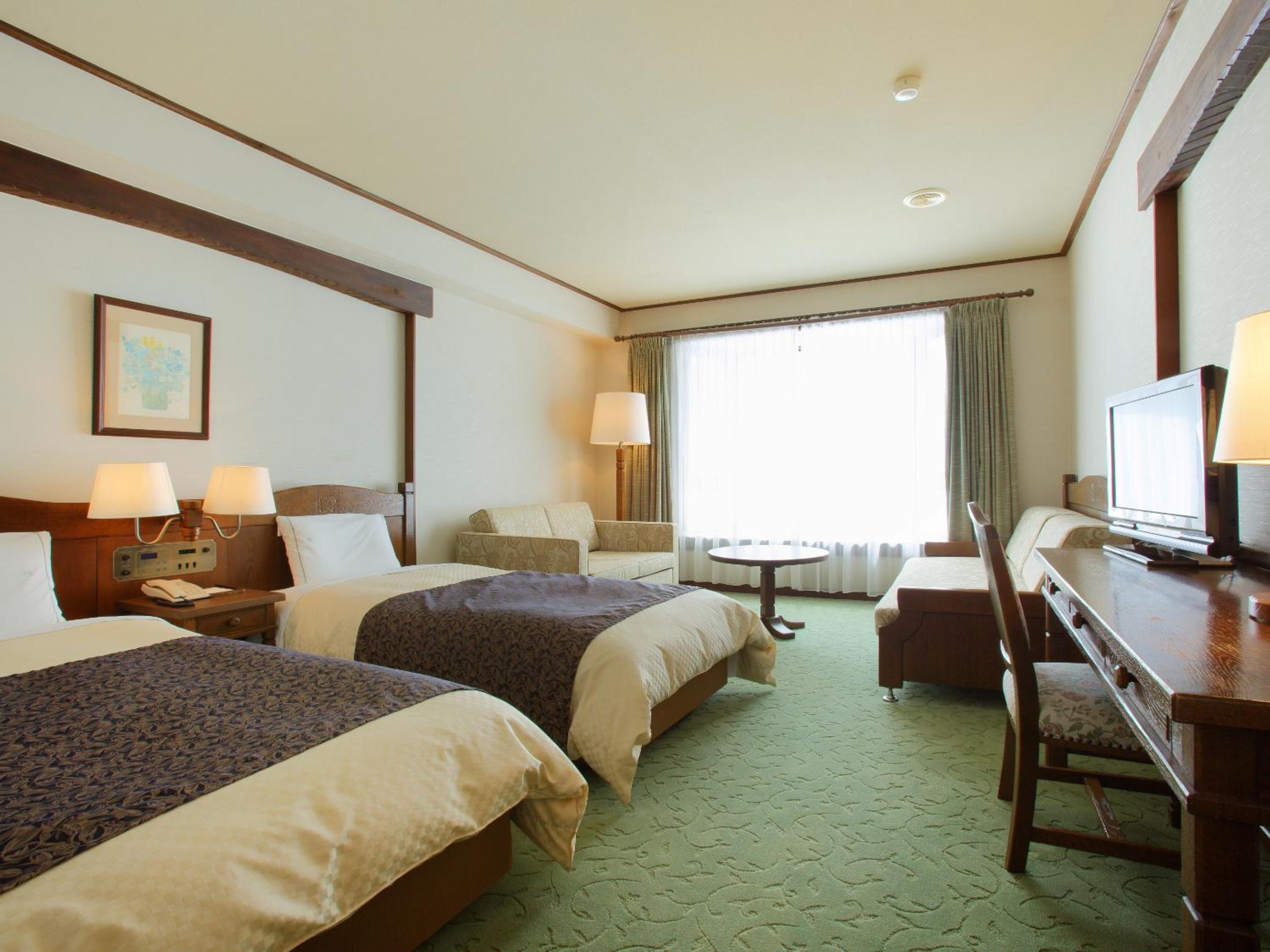 Deluxe Twin Room - Photo 2