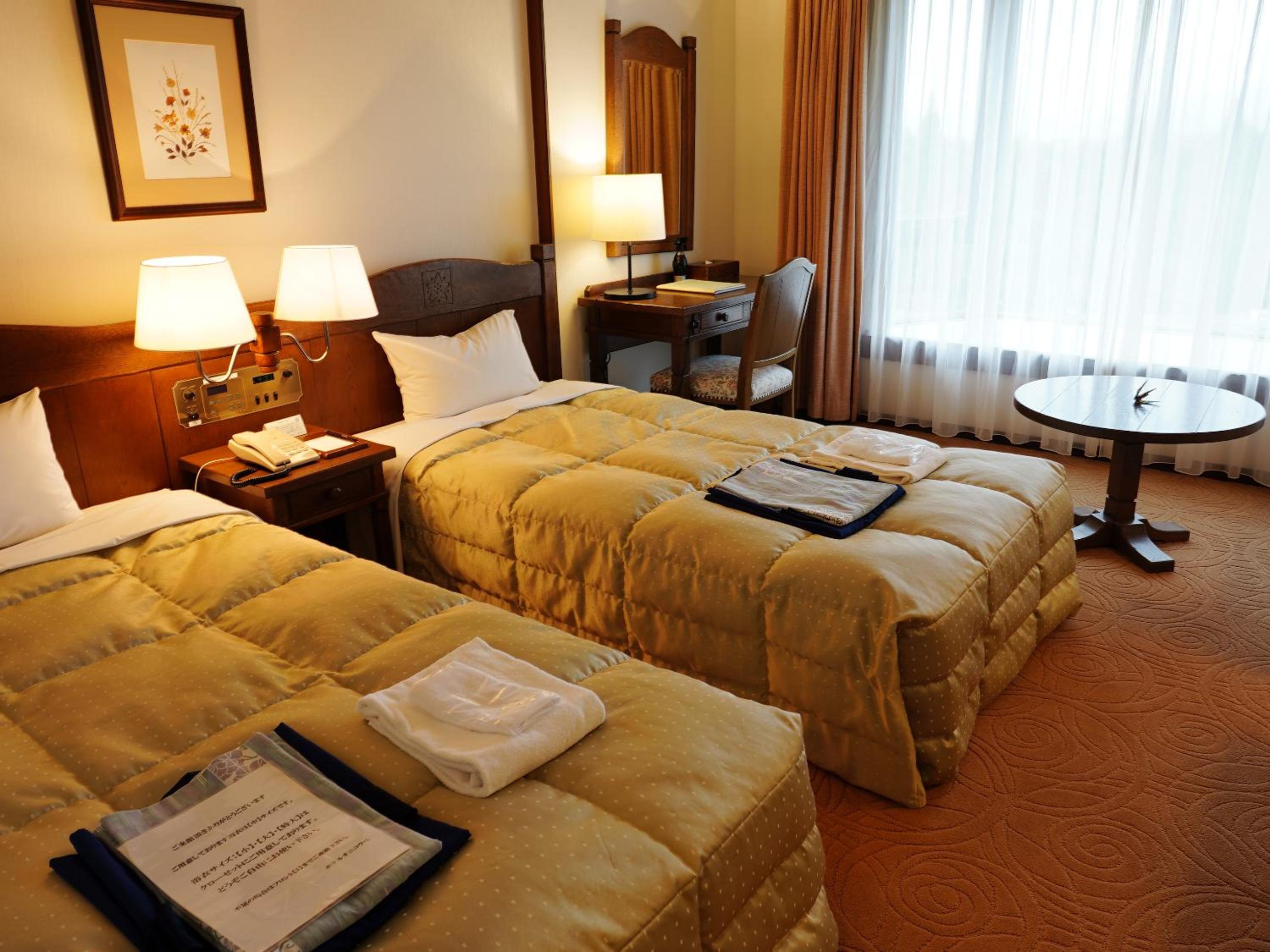 Standard Twin Room - Photo 1