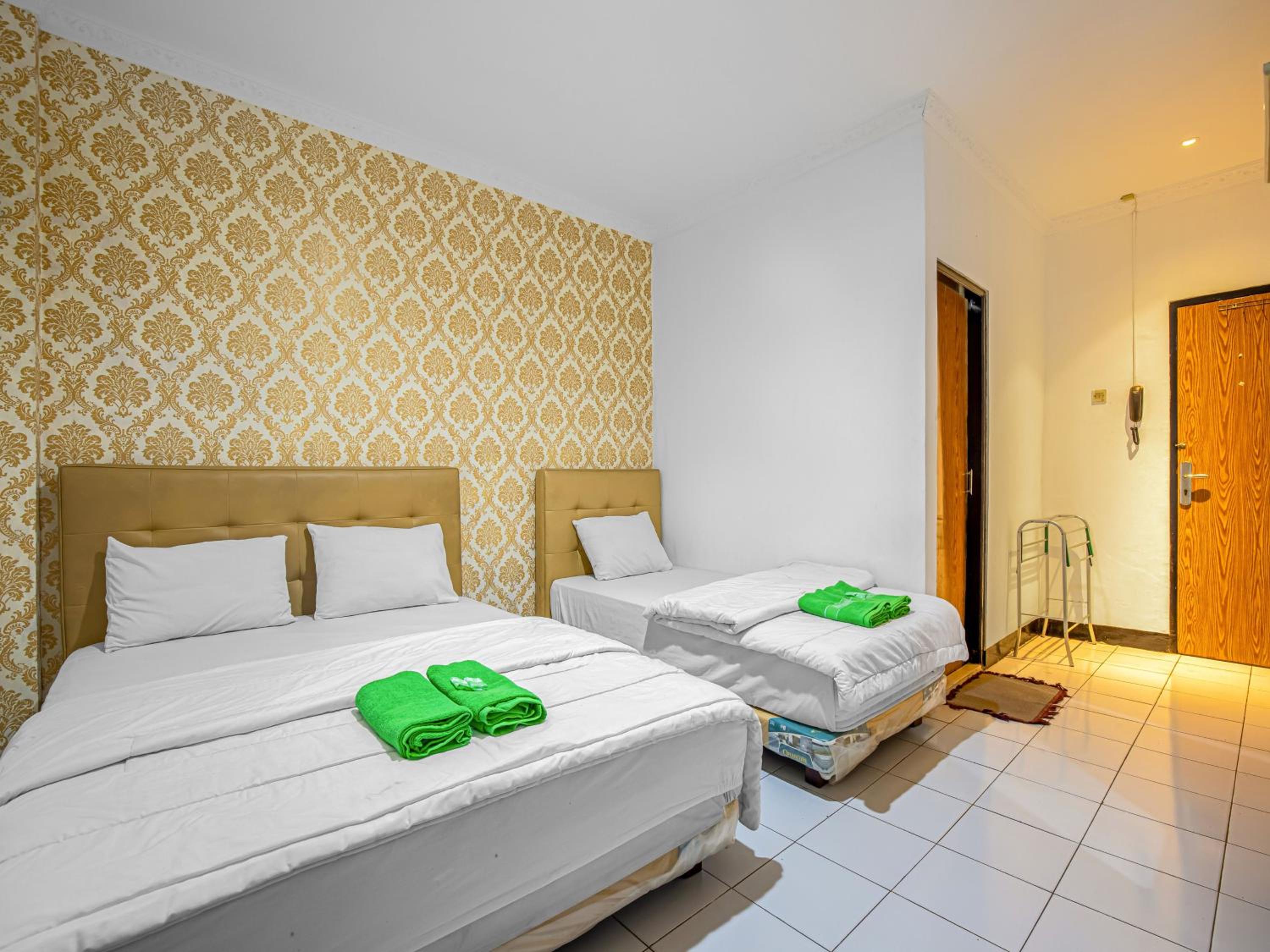 Triple Room - Photo 1