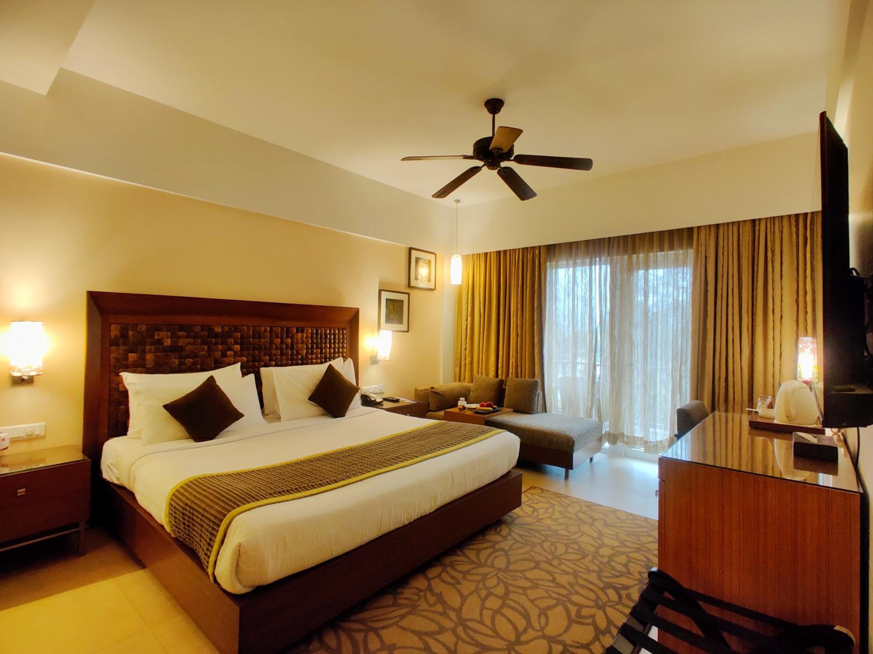 Classic King Room with 20% off on Session on Spa , Food & Beverages and complimentary Access to Water Park Rides - Photo 1