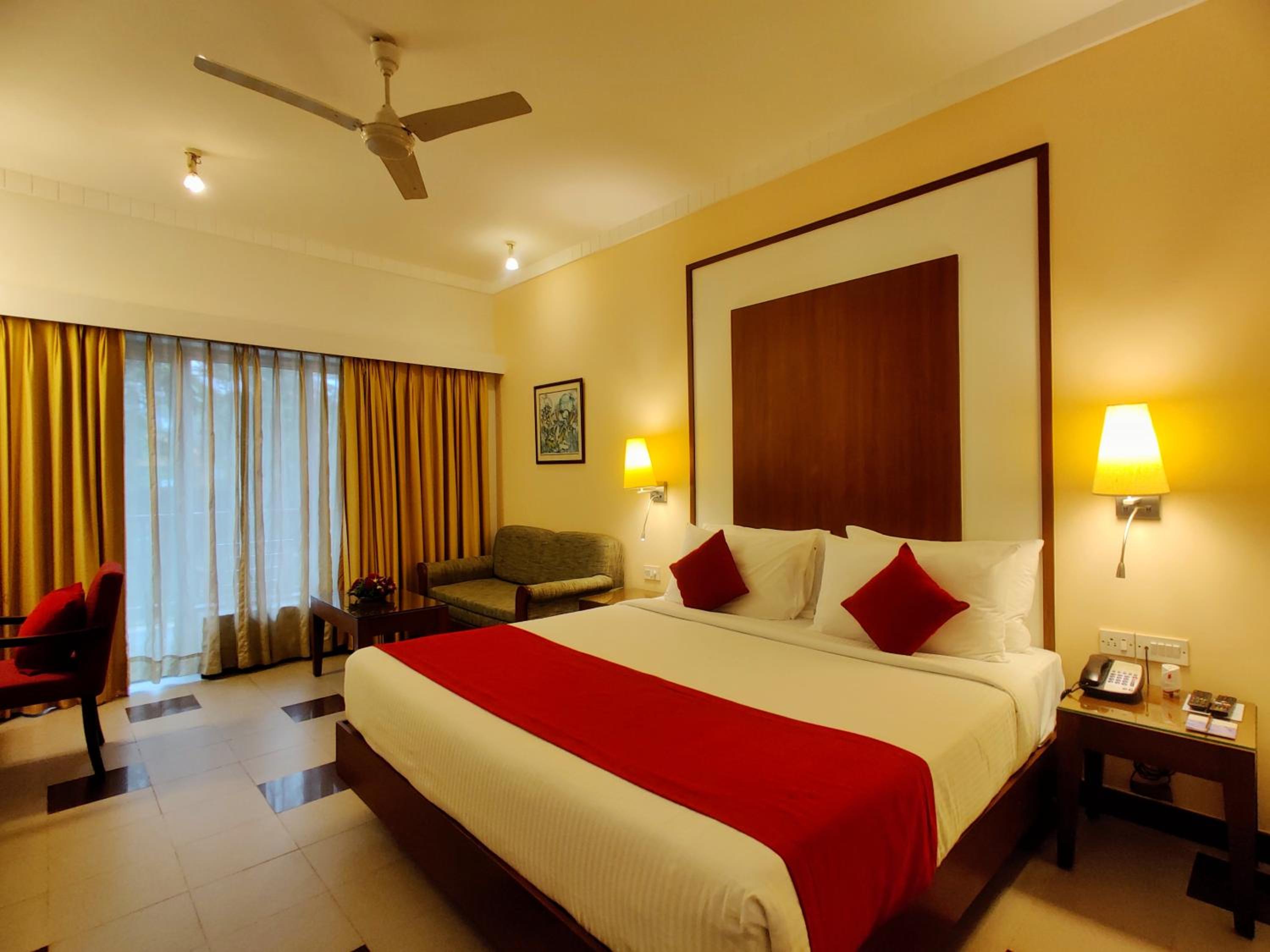 Deluxe King with 20% off on Session on Spa , Food & Beverages and complimentary Access to Water Park Rides - Photo 1