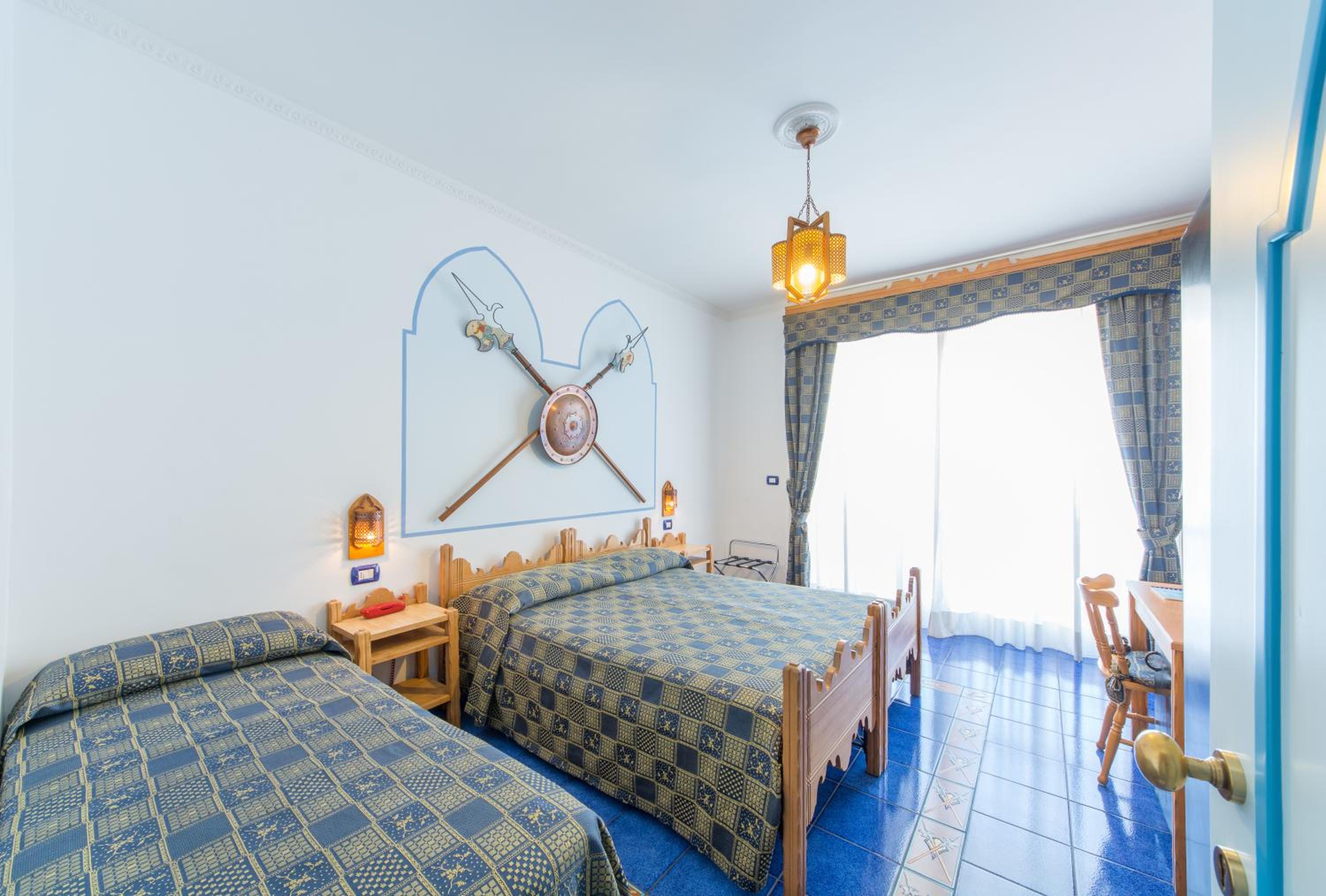 Dreibettzimmer mit Balkon