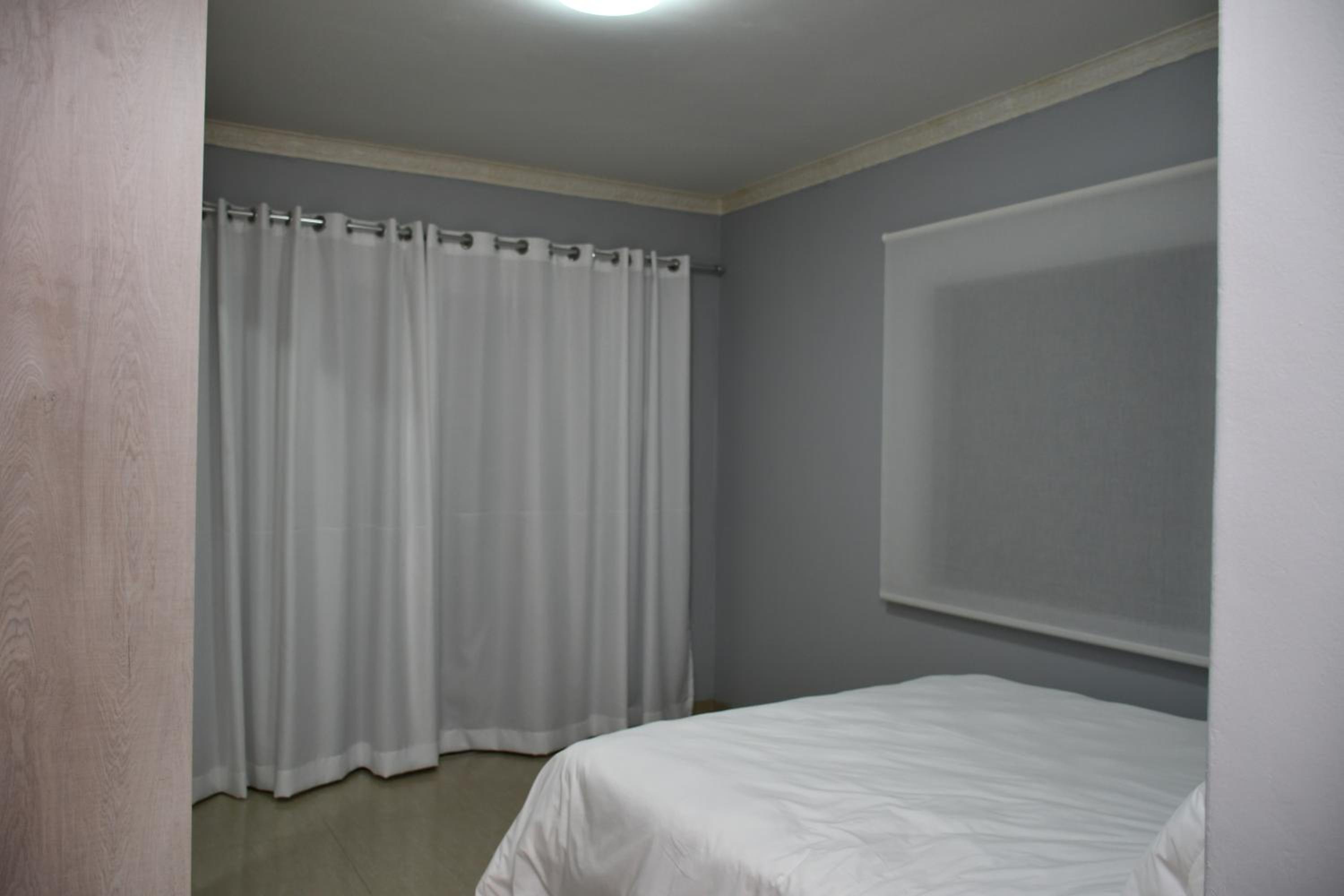 Family Room with Balcony - Photo 1